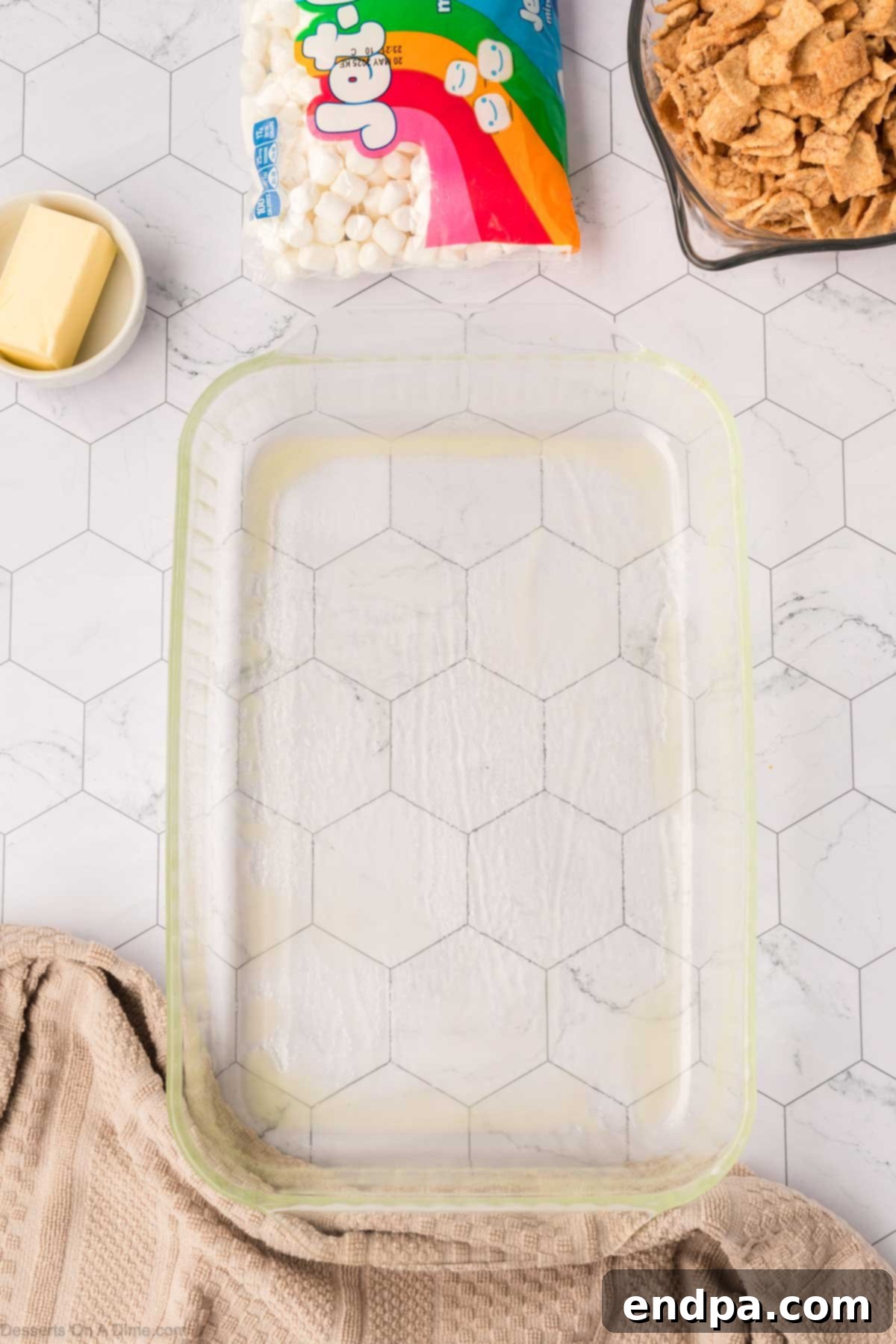 Baking dish thoroughly coated with non-stick cooking spray, ready for the cereal mixture.