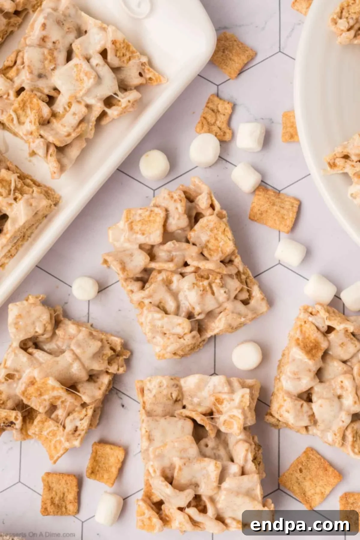 Close-up of a stack of Cinnamon Toast Crunch Bars showing their delightful gooey and crunchy texture.