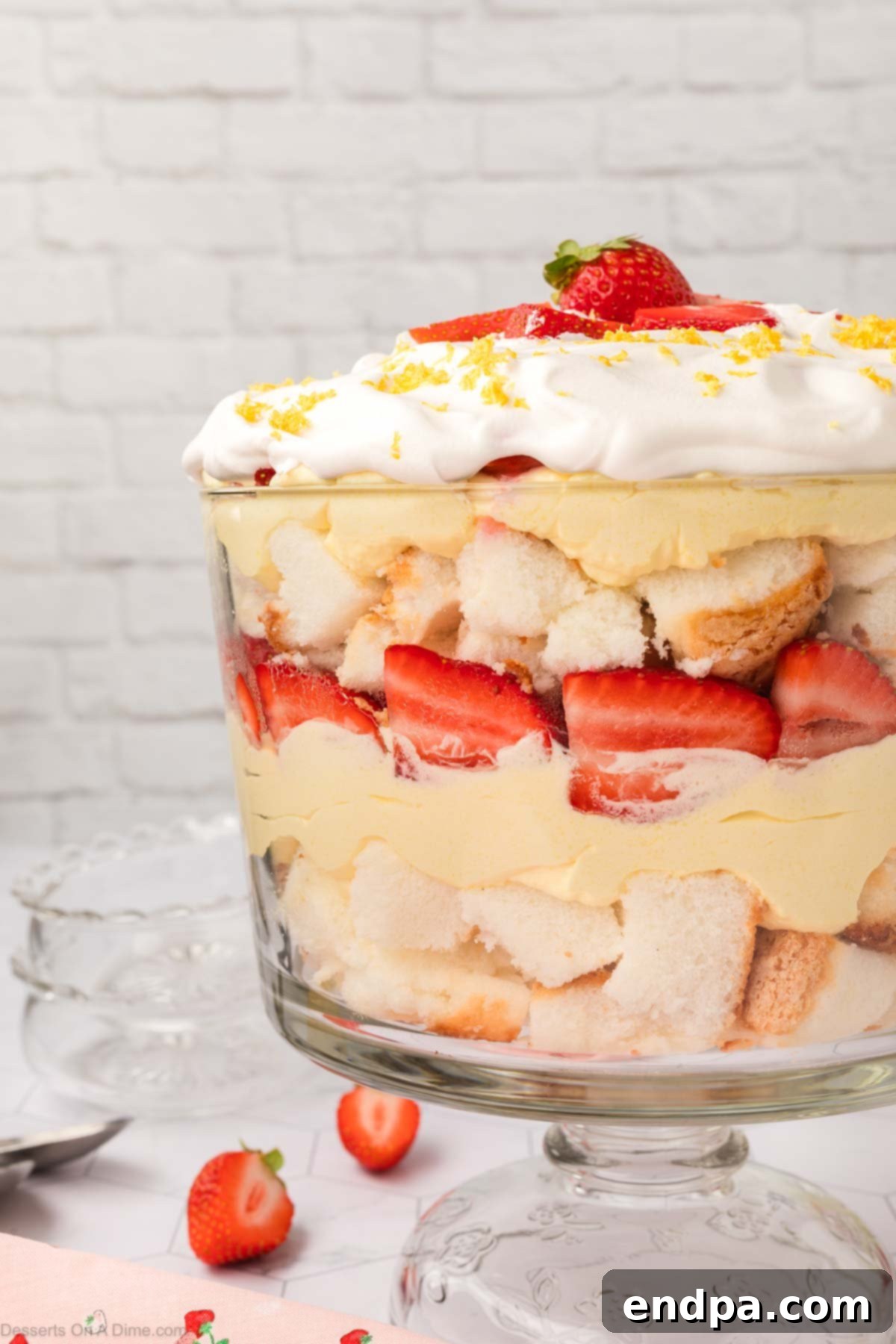 Lemon Strawberry Trifle beautifully displayed in a clear bowl, ready to be enjoyed.