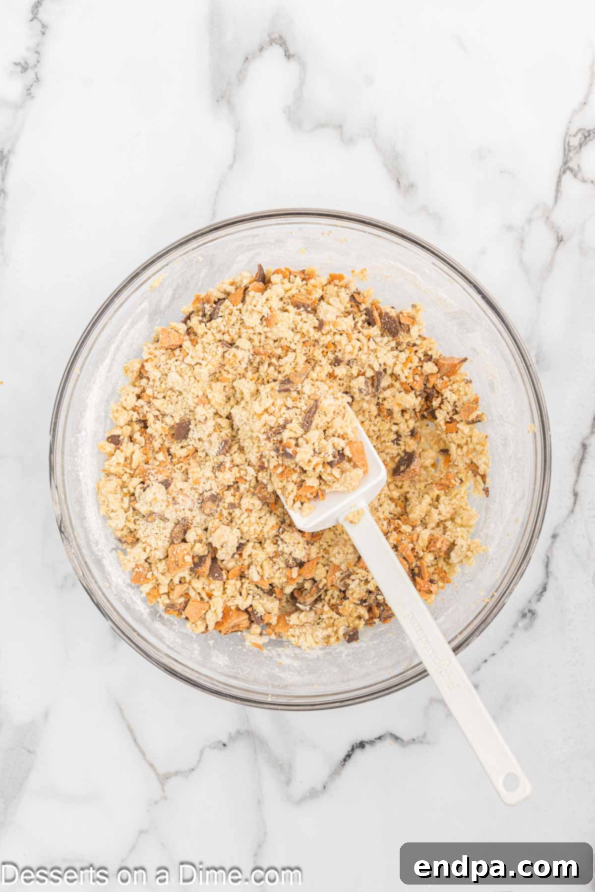 Wet and dry ingredients combined together and candy folded in.