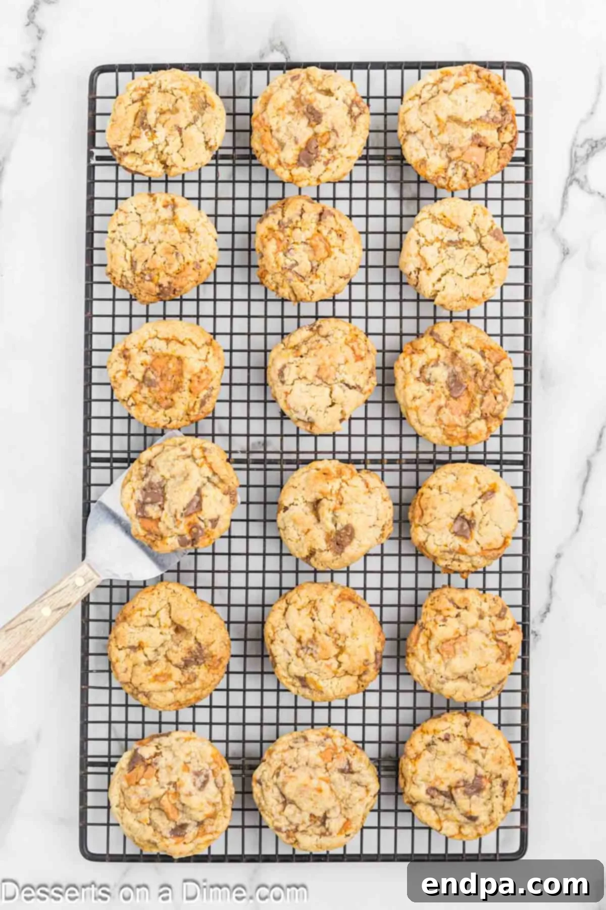 Butterfinger Cookies on wire rack cooling.