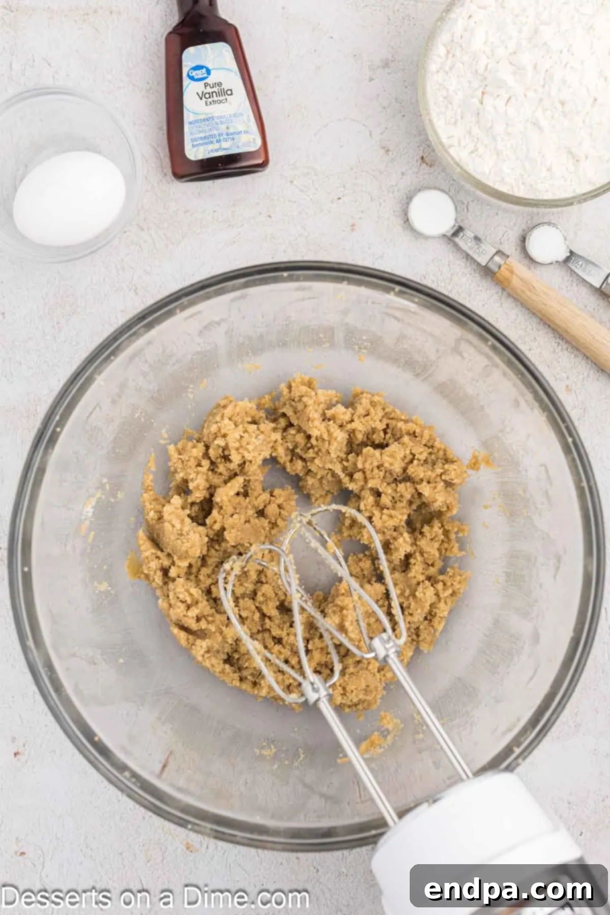 Fluffy Cloud Cookies 4 Softened butter and brown sugar are combined in a large mixing bowl, ready for creaming.