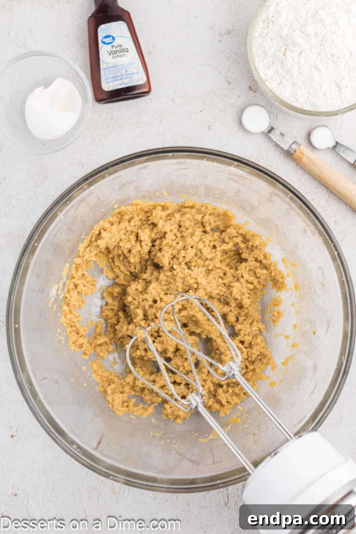 Fluffy Cloud Cookies 5 Egg and vanilla extract are added to the creamed butter and sugar mixture and mixed until fully incorporated.