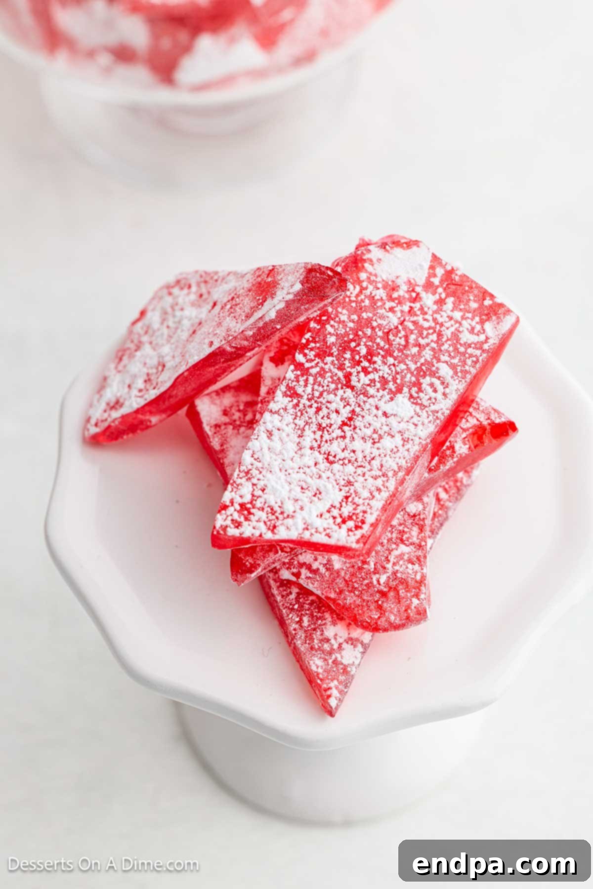 Finished hard candy pieces arranged in a bowl, ready to be served and enjoyed.