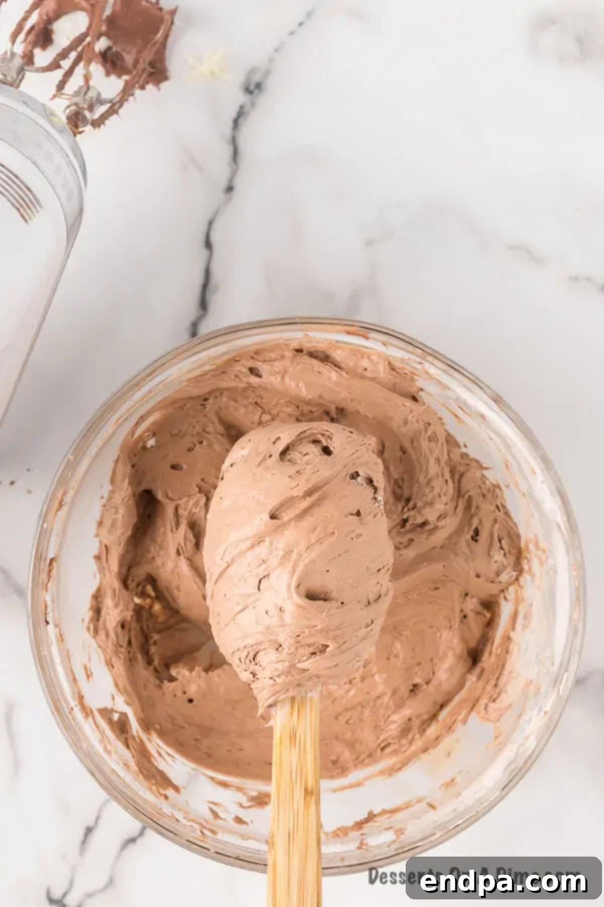 Sweet Chocolate Fruit Indulgence 6 Whipped topping gently folded into the chocolate cream cheese mixture.