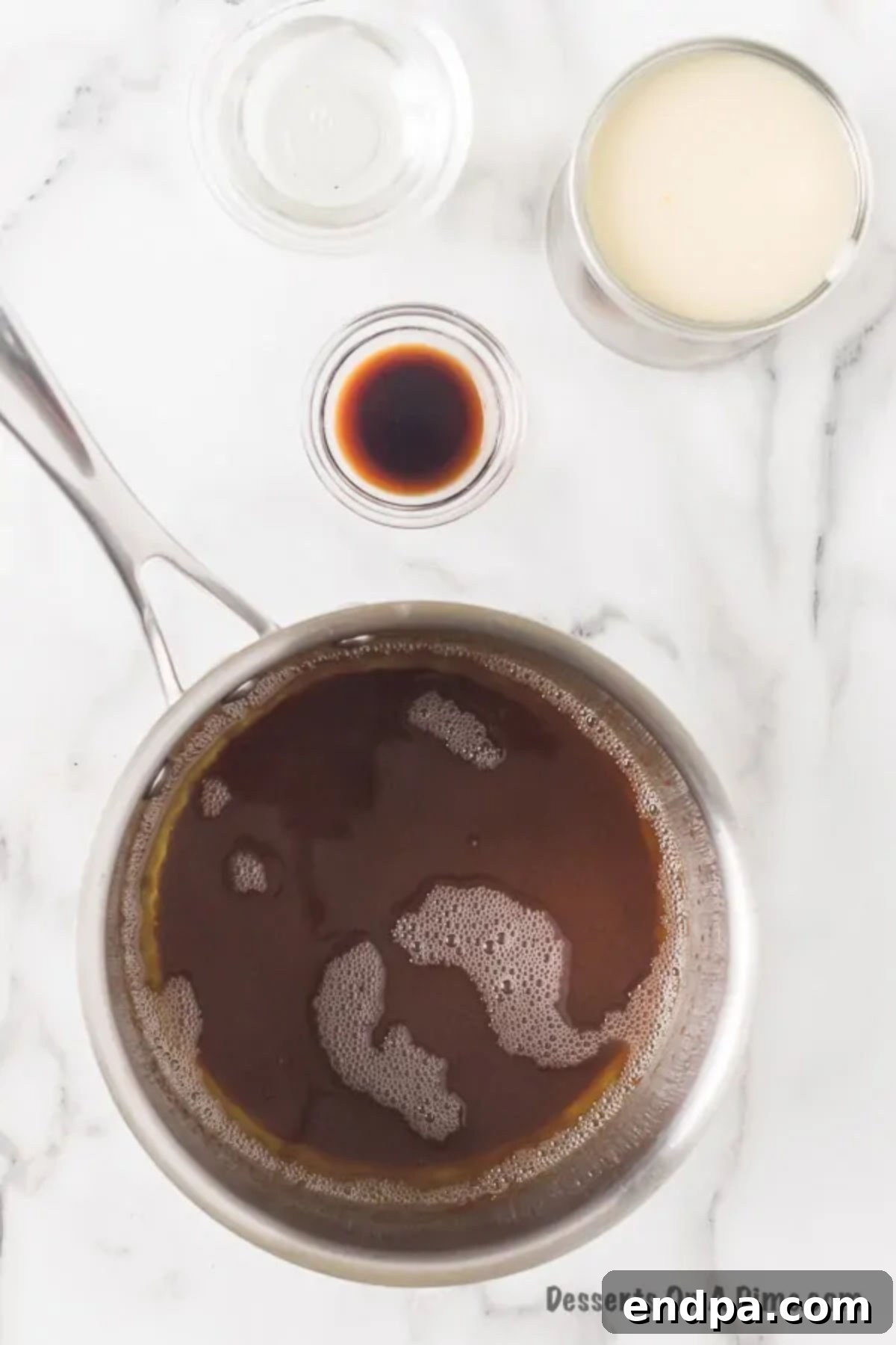 Sauce pan with caramel ingredients.