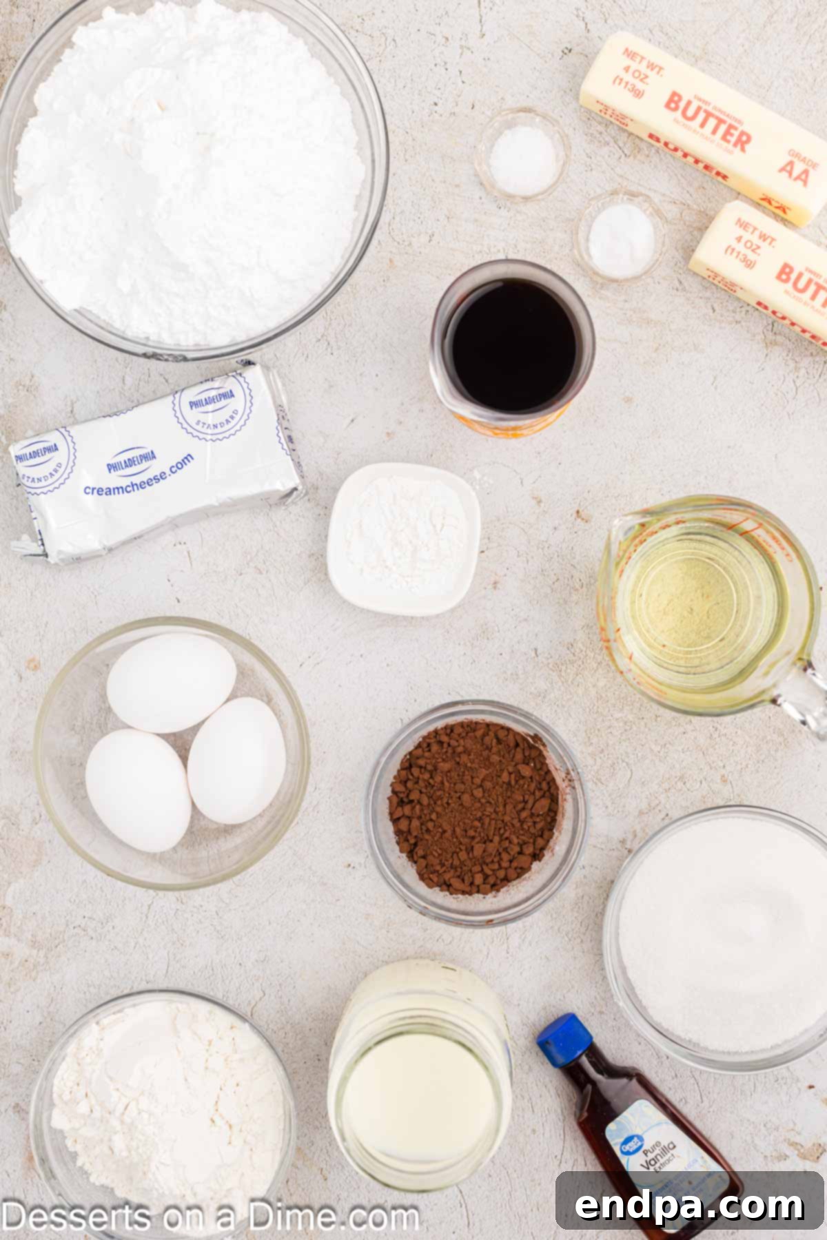 Ultimate Dark Chocolate Decadence 3 Ingredients laid out for making blackout cake, including flour, baking soda, cocoa powder, vanilla extract, oil, eggs, buttermilk, coffee, cream cheese, and salt, ready for baking.