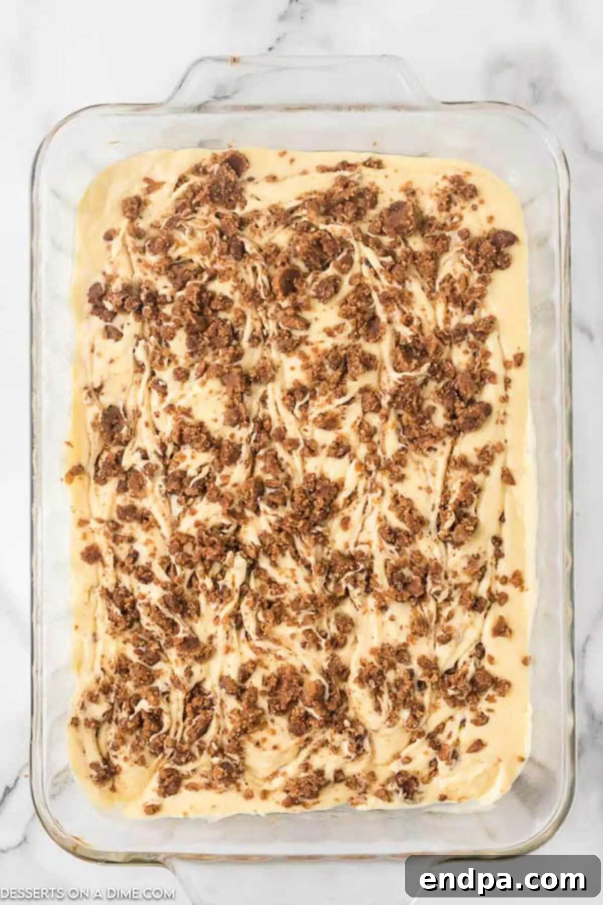 Indulgent Cinnamon Roll Cake Delight 8 Swirling the cinnamon mixture into the cake batter