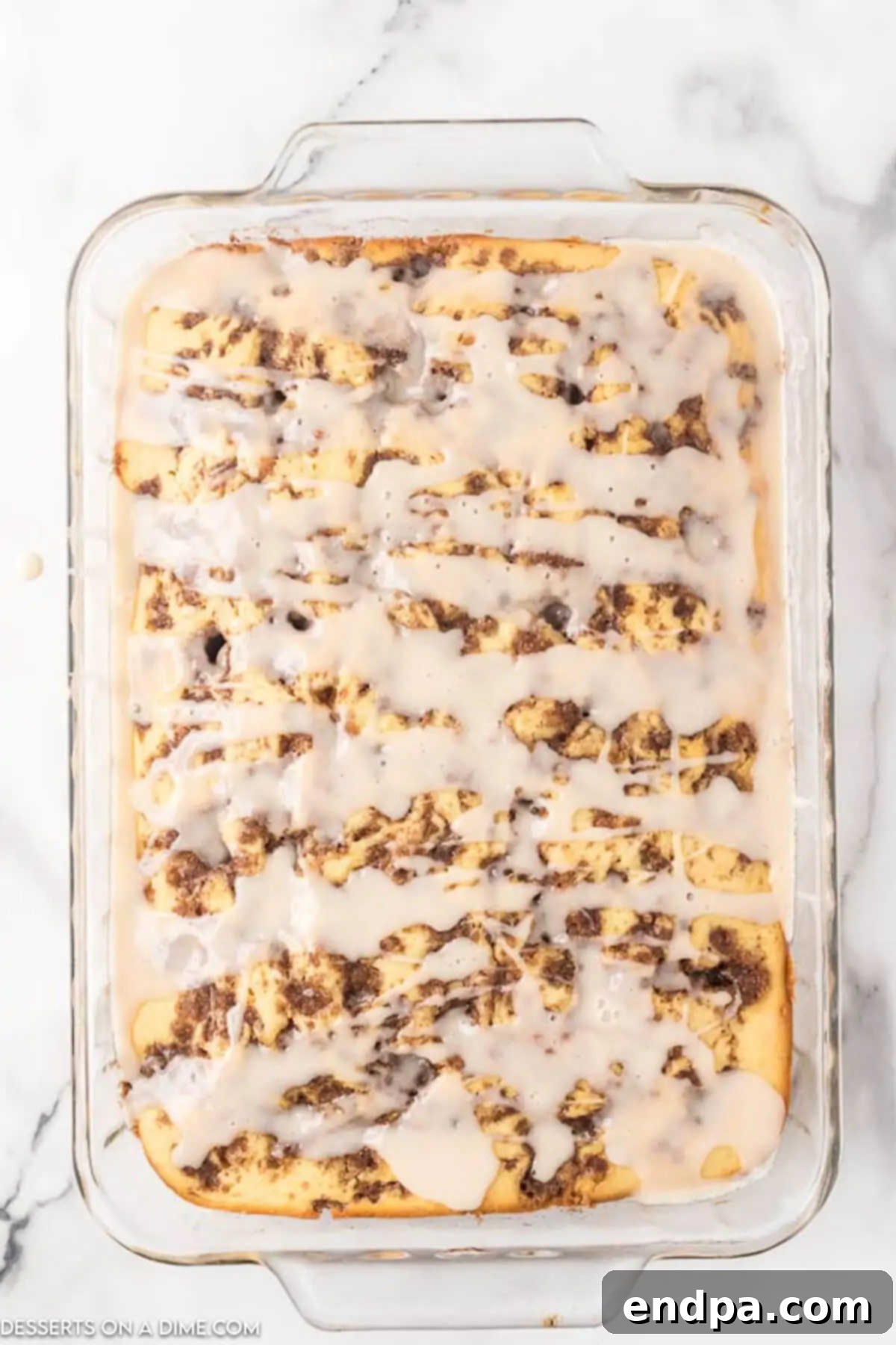 Indulgent Cinnamon Roll Cake Delight 10 Cinnamon Cake with a glaze on top