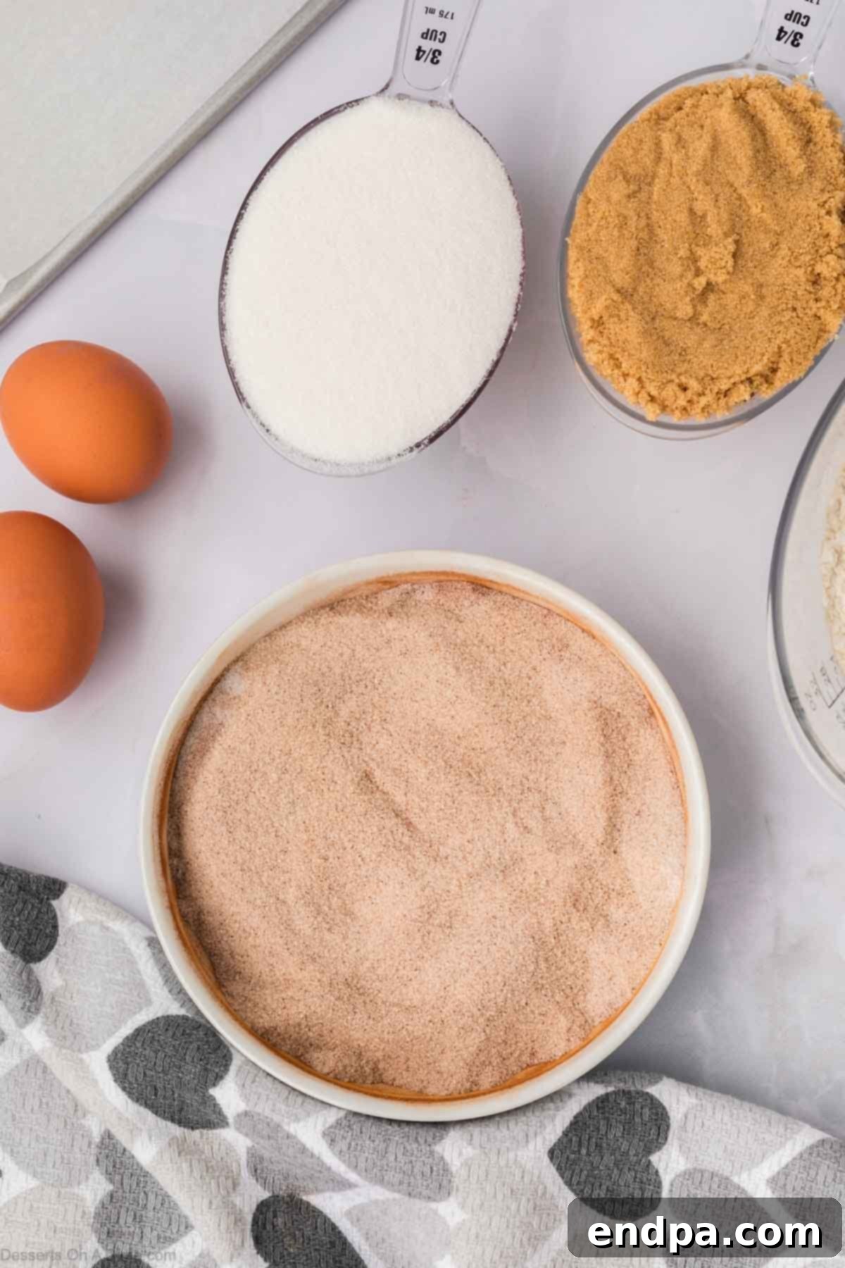 Spanish Cinnamon Sugar Cookies 5 Cinnamon and sugar in a bowl combined together.
