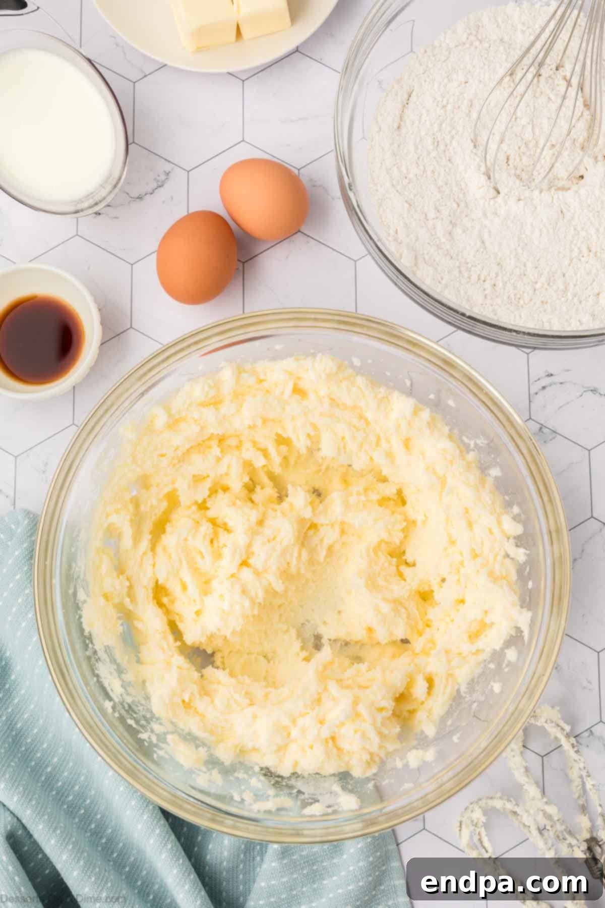 Softened butter and granulated sugar beaten together in a bowl until light and fluffy.