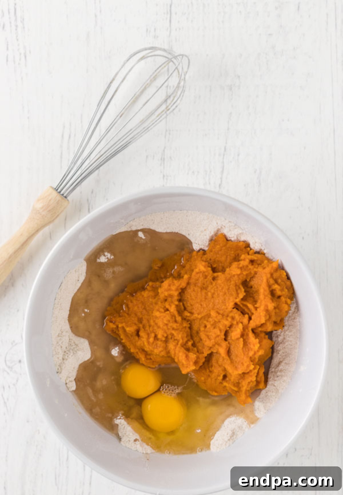 Stir the wet ingredients into the dry ingredients.