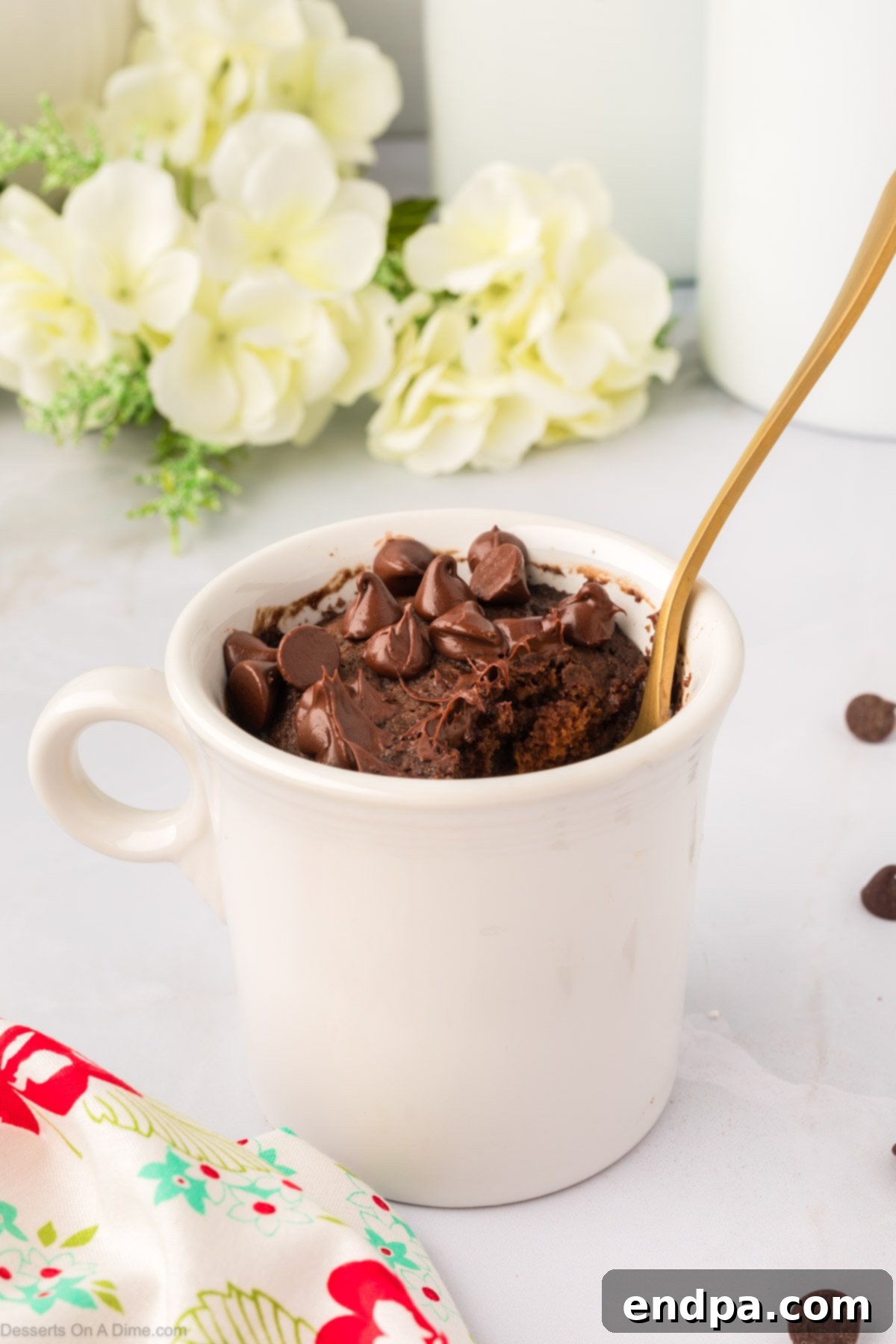 keto cake in a mug with spoon. 