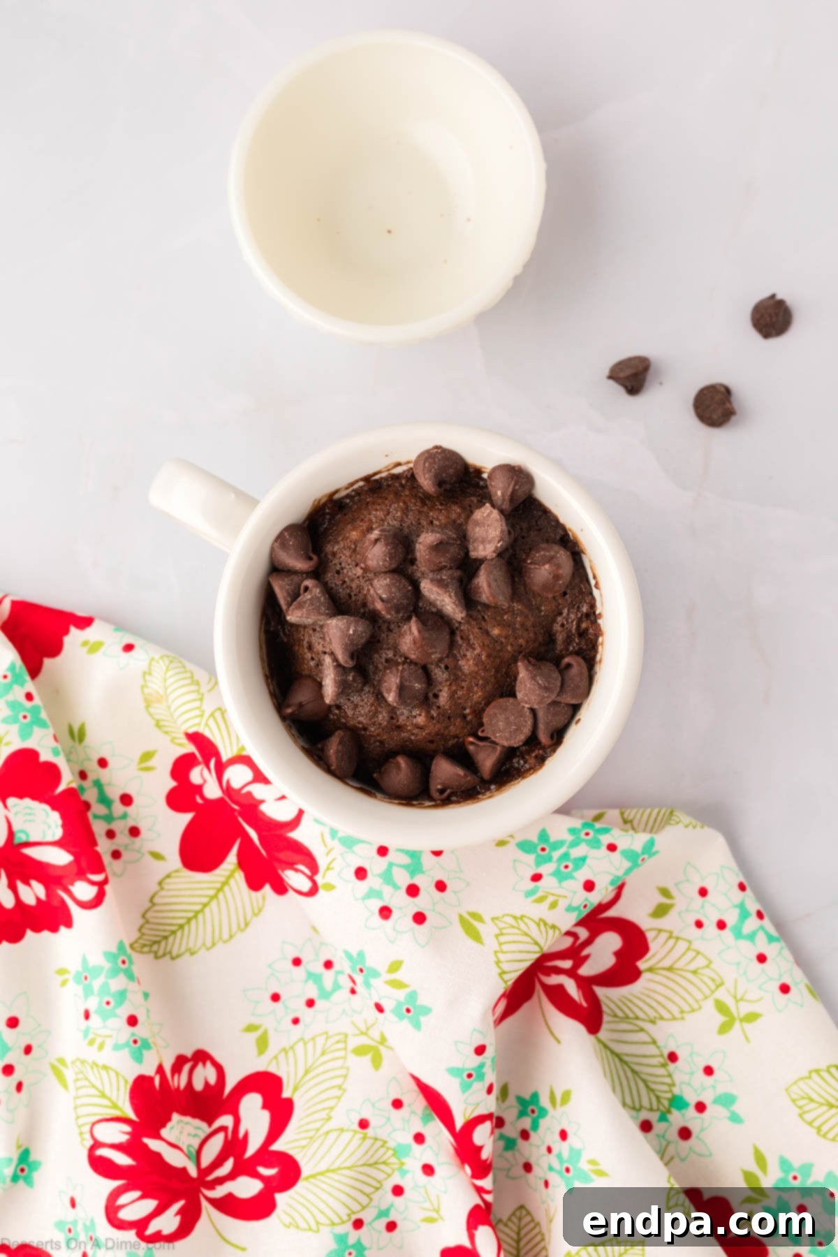 Chocolate chips on top of mug. 
