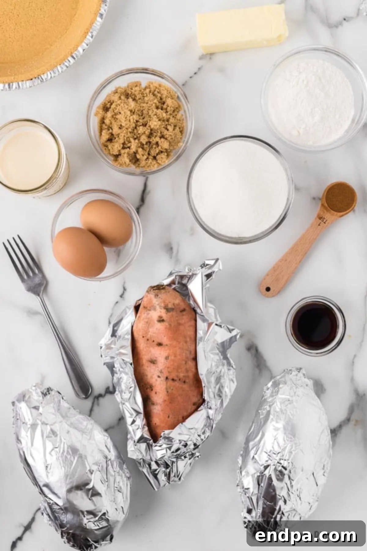 Ingredients needed for sweet potato pie - Sweet Potatoes, sugar, brown sugar, vanilla pudding mix, evaporated milk, eggs, butter, cinnamon, vanilla extract, graham cracker crust