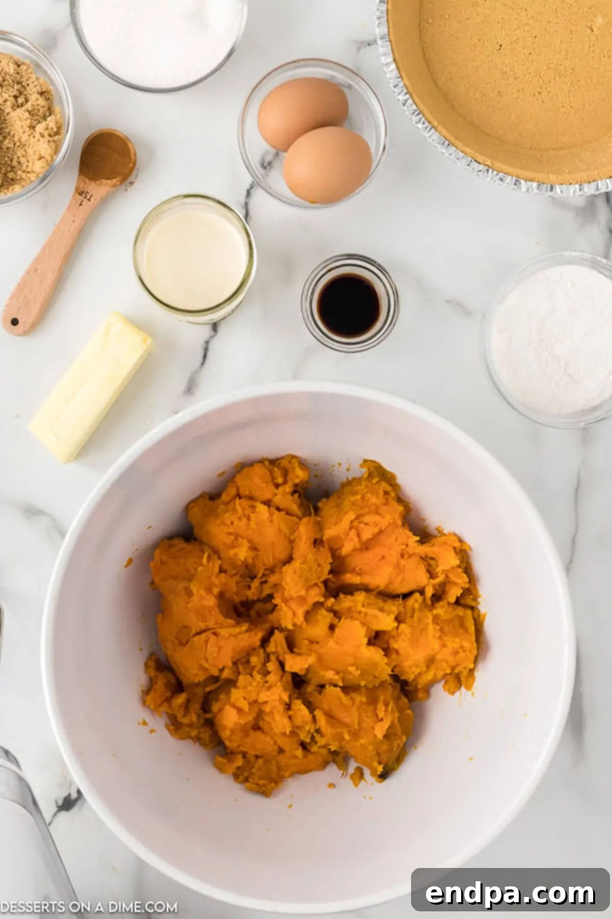 Bowl of sweet potatoes mashed together. 