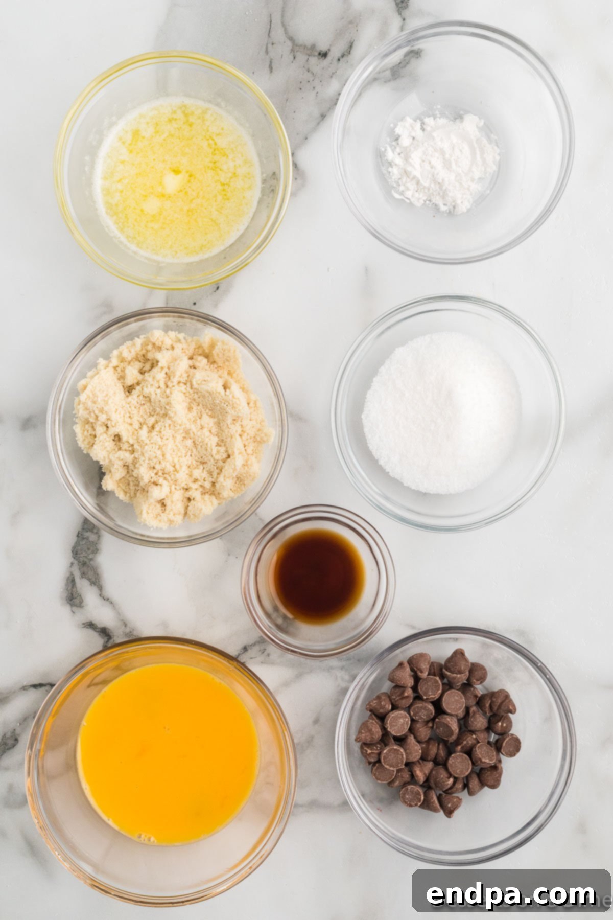 Heavenly Keto Chocolate Chip Mug Cake 3 Ingredients for keto chocolate chip mug cake: butter, almond flour, Swerve, and sugar-free chocolate chips.