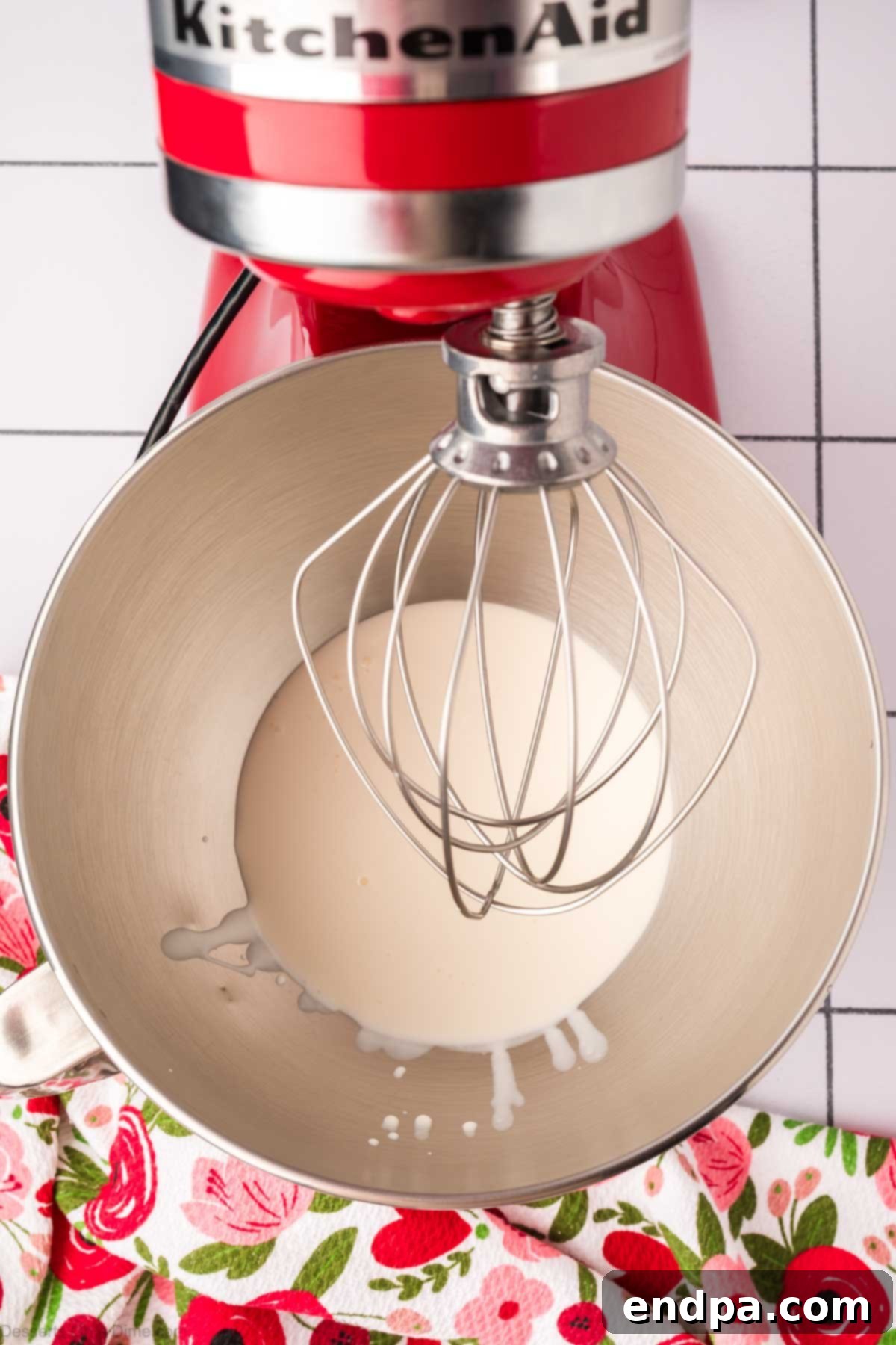 Light & Luscious Chocolate Frosting 4 Heavy cream in a mixing bowl before whipping.
