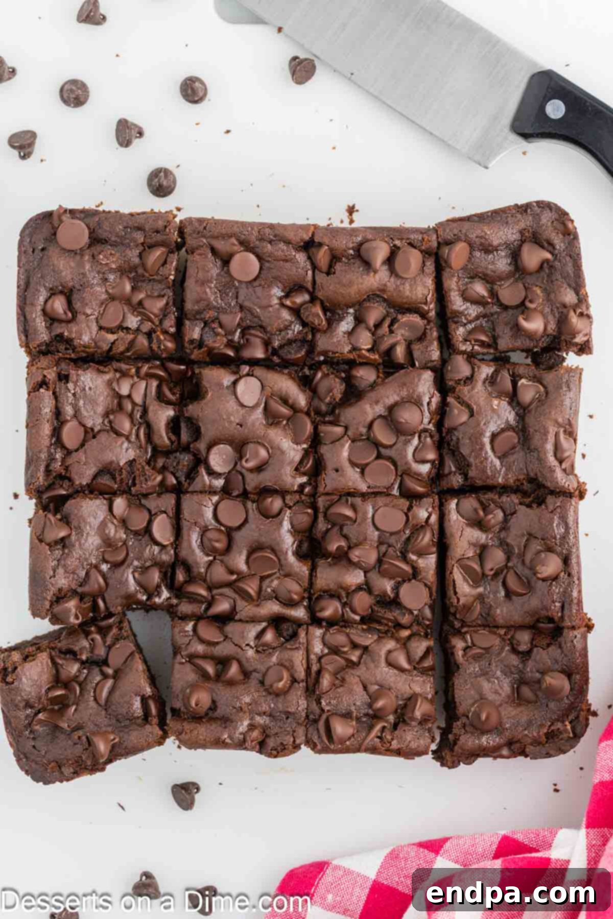 Decadent Cottage Cheese Swirl Brownies 9 Fudgy brownies cut into neat pieces, ready to be served.