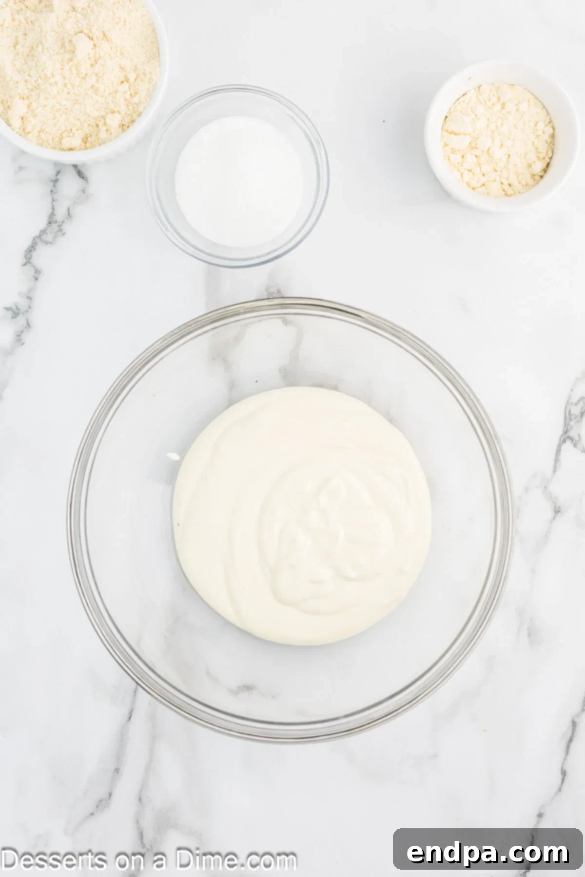 Smooth, creamy cottage cheese and egg mixture in a mixing bowl after blending.