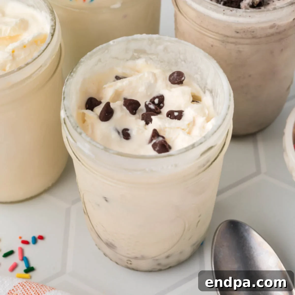 Final presentation of creamy Mason Jar Ice Cream topped with delicious ingredients.