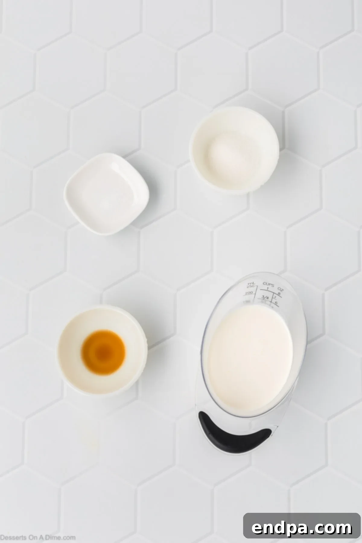 All the core ingredients for mason jar ice cream laid out: heavy cream, granulated sugar, vanilla extract, and a pinch of salt, along with some optional add-ins.