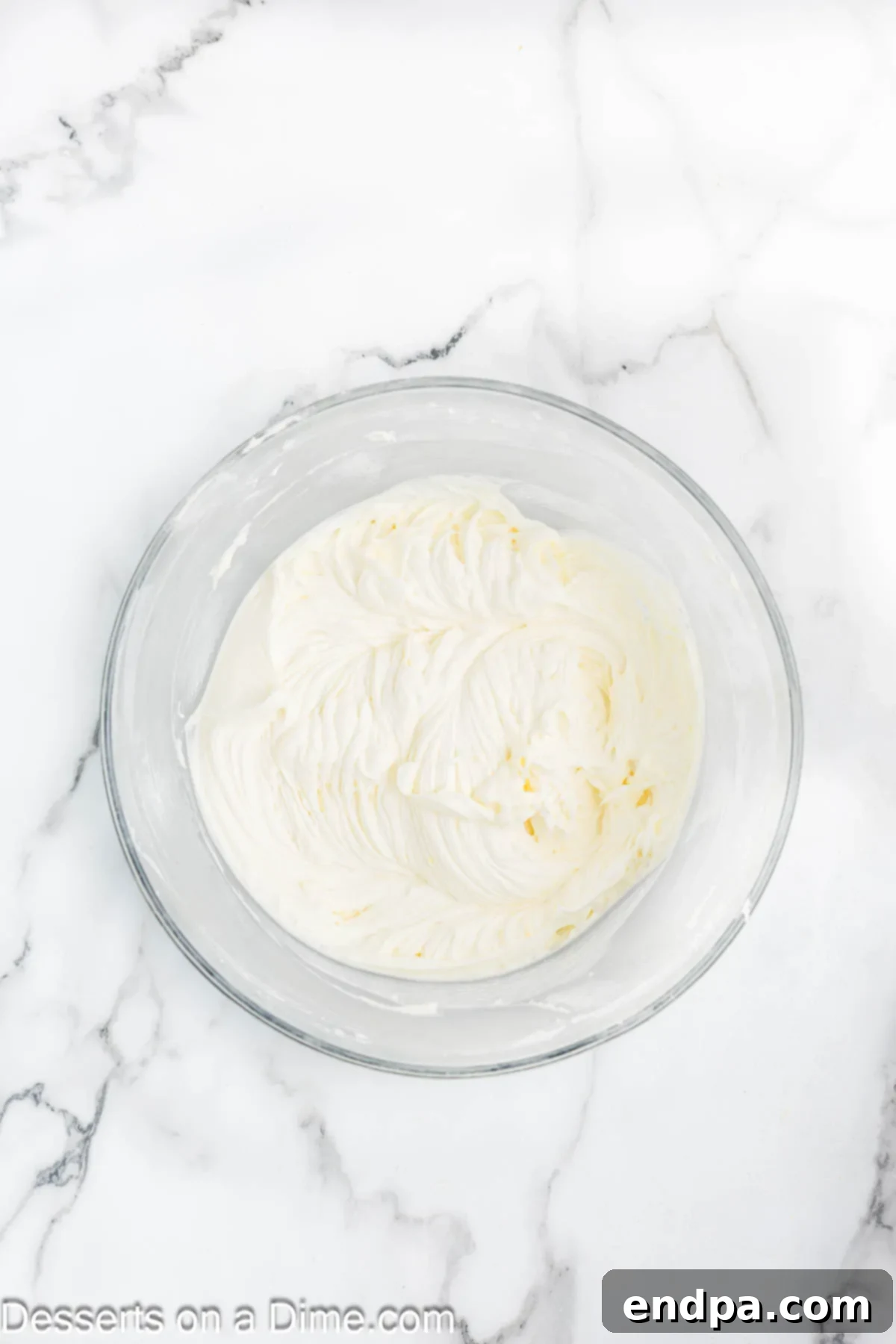 Lemon Berry Bliss 13 Smooth and fluffy lemon cream cheese frosting ready to be spread.