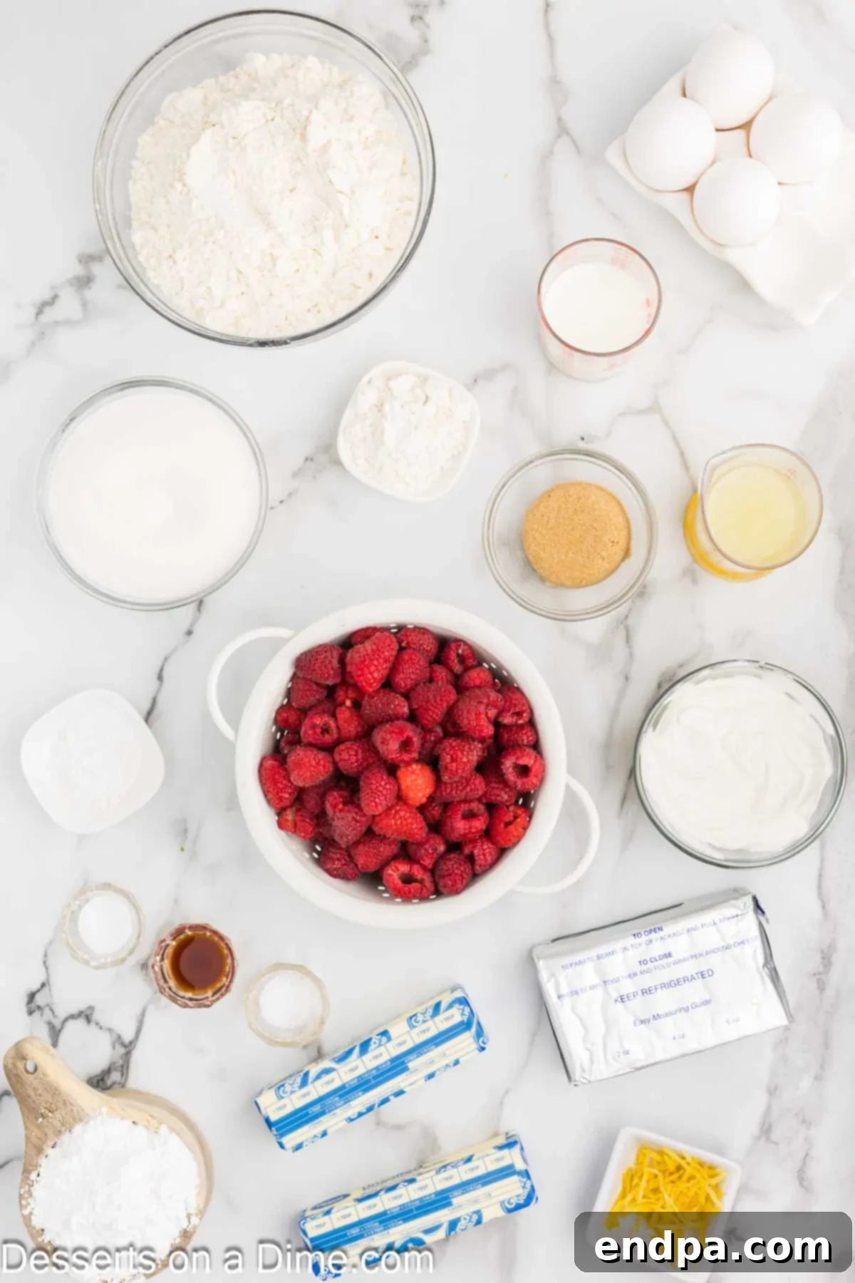 Lemon Berry Bliss 3 Ingredients for lemon raspberry cake including butter, sugar, lemon juice, lemon zest, fresh raspberries, flours, and vanilla extract.