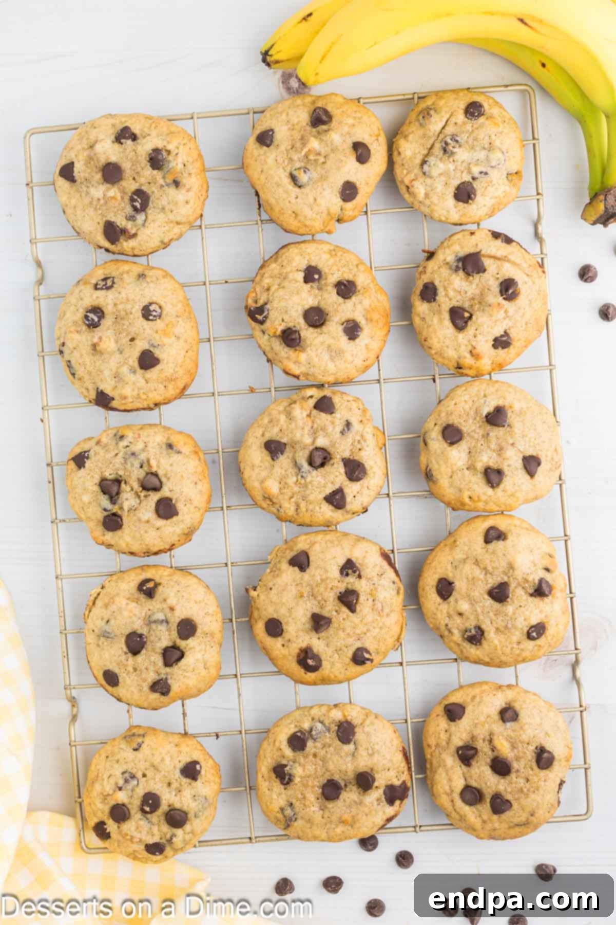 Warm banana cookies cooling perfectly on a wire rack.