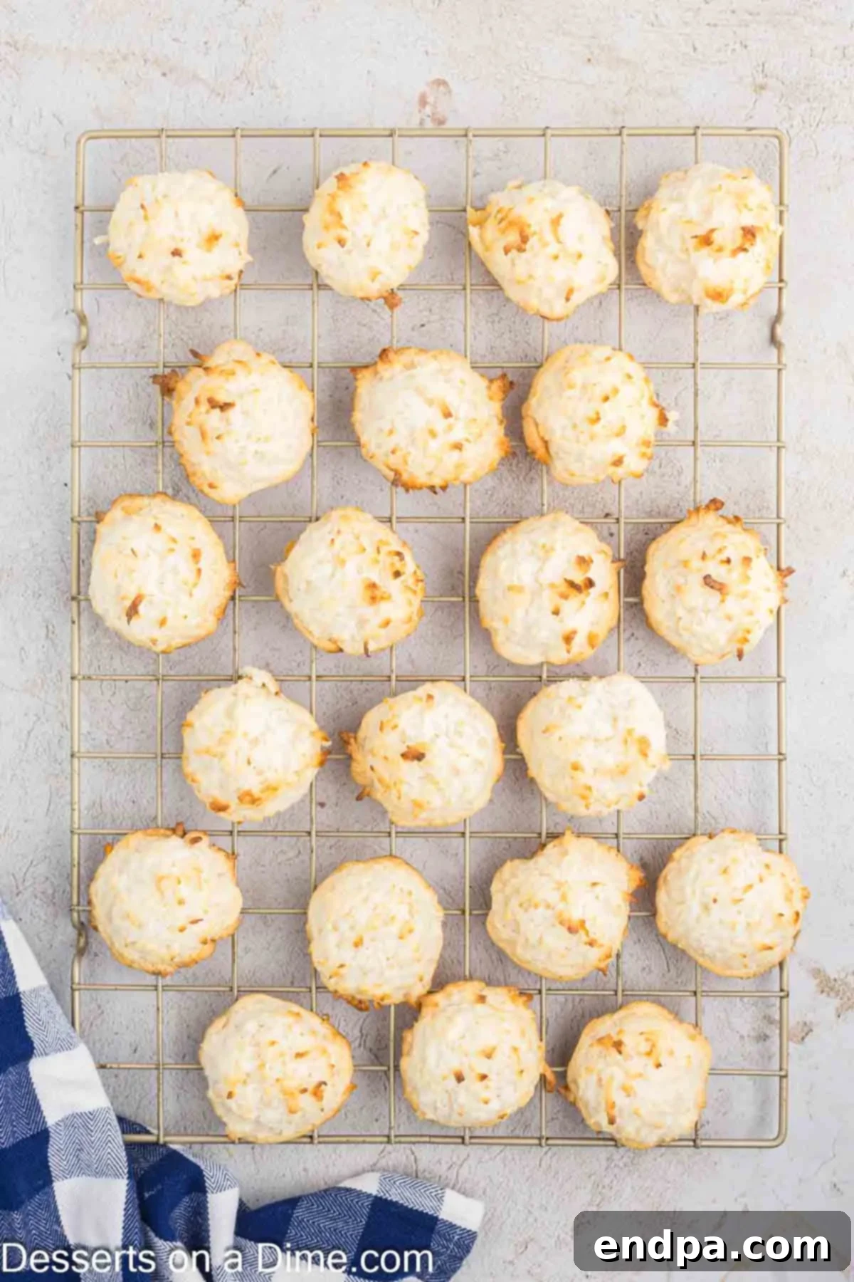 Baked Coconut Macaroons cooling on a wire rack.