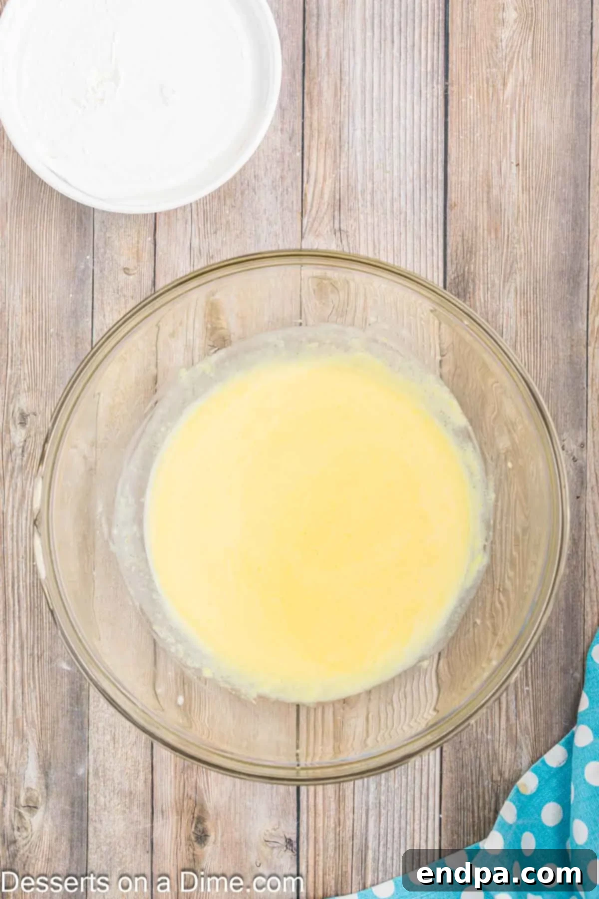 Velvet Orange Dream Cake 4 Cake batter combined in a bowl, showing its smooth consistency before baking.