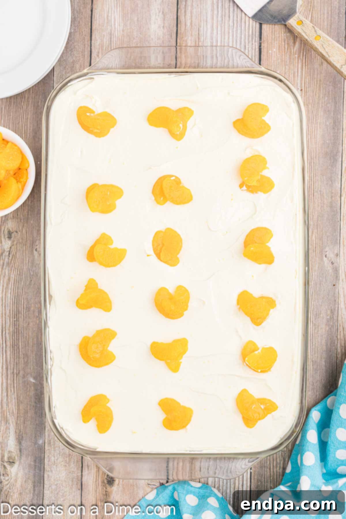 Velvet Orange Dream Cake 10 Orange creamsicle cake frosted with a smooth, creamy whipped topping and garnished with bright mandarin orange slices.