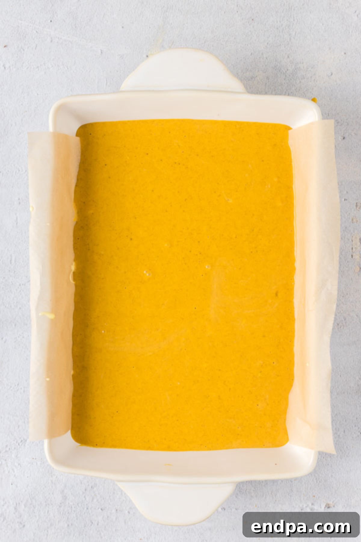 Spiced Pumpkin Cheesecake Bars 10 Pumpkin cheesecake in a baking dish