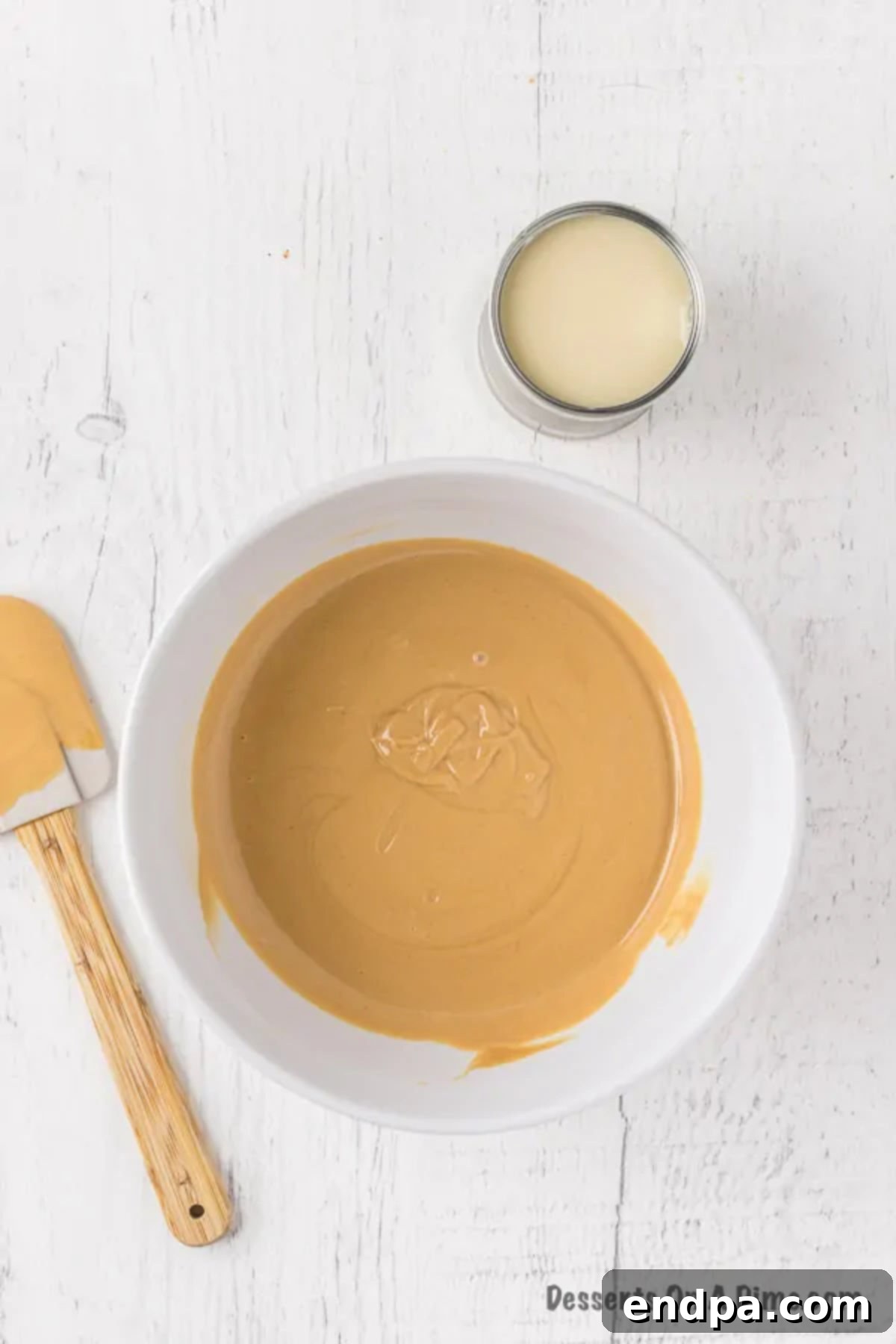 Melted peanut butter and white chocolate chips, stirred until smooth.