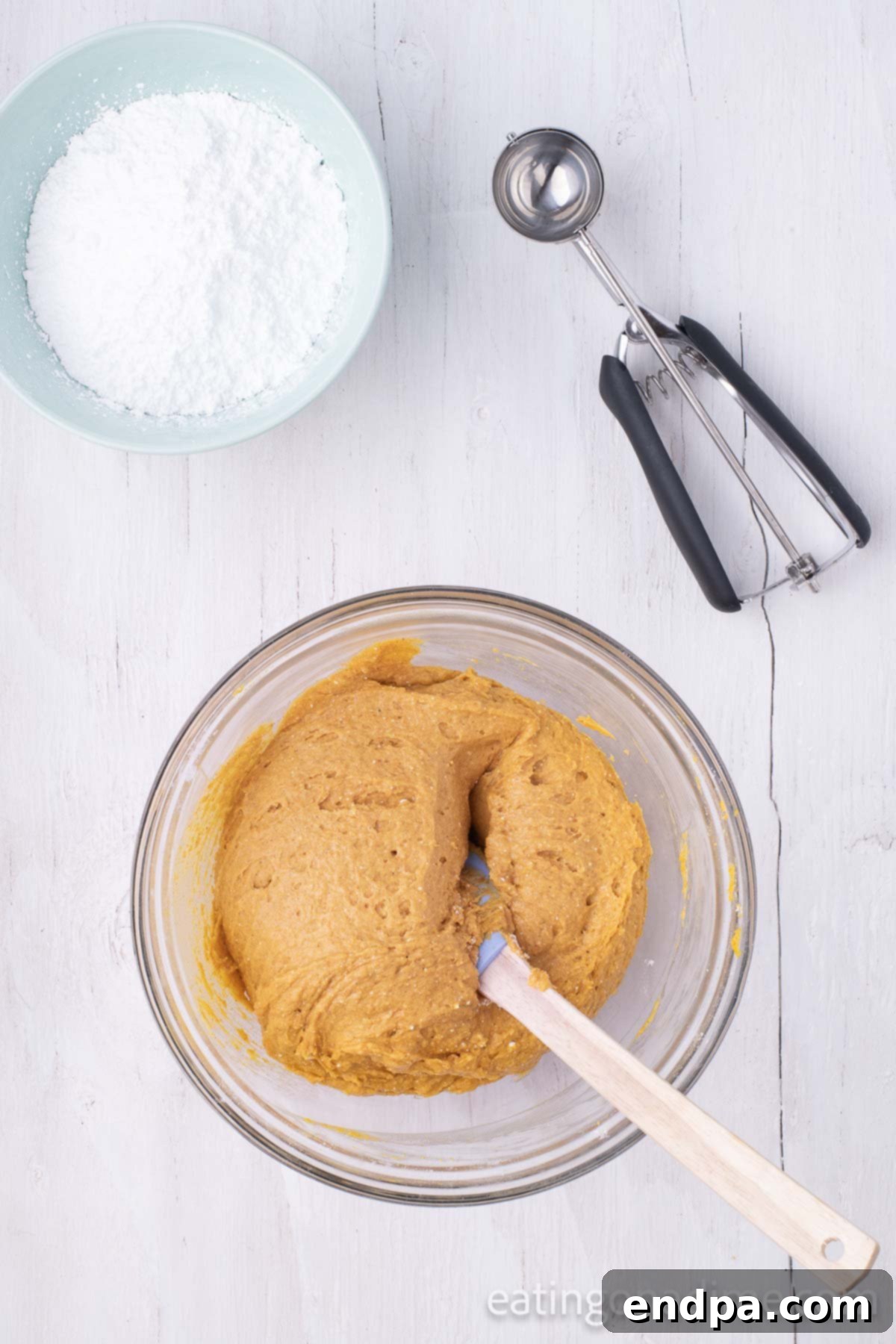 Mixing bowl with mixture combine together. 