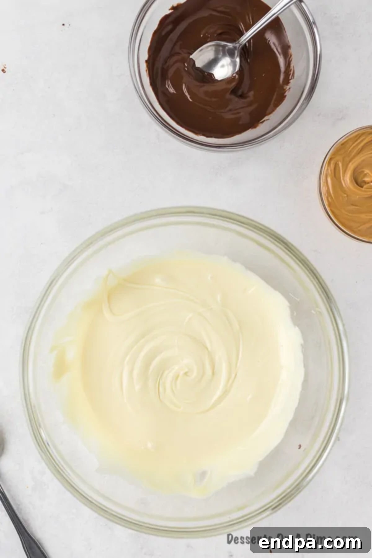 Melting vanilla chips (white chocolate) in a separate microwave-safe glass bowl