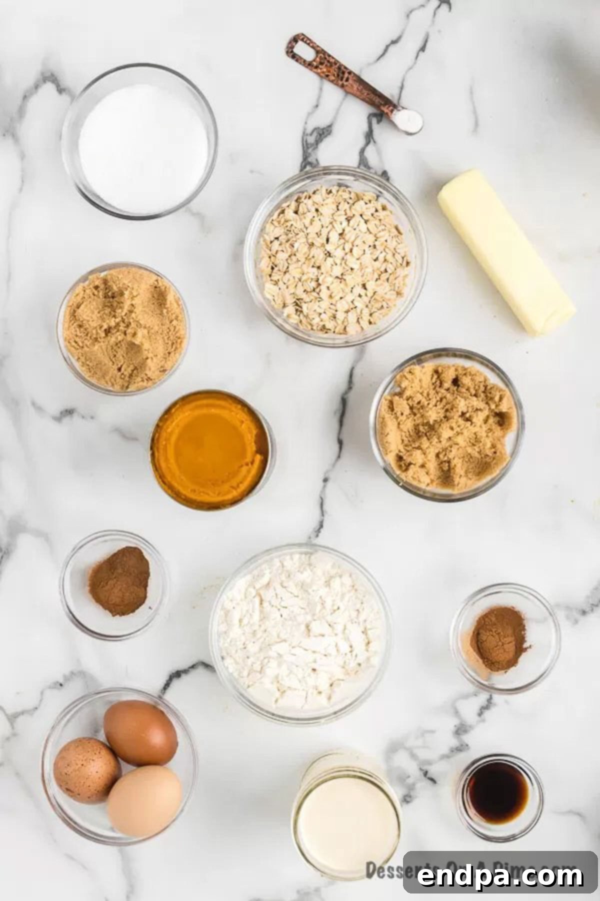 Autumn Pumpkin Crumble 3 All the ingredients for Pumpkin Crisp laid out: eggs, brown sugar, pure pumpkin puree, vanilla extract, pumpkin pie spice, old-fashioned oats, all-purpose flour, ground cinnamon, and unsalted butter.