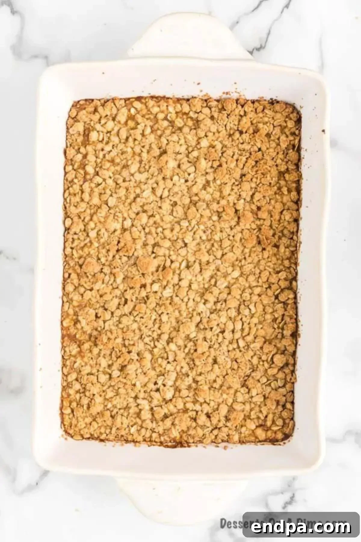 Autumn Pumpkin Crumble 8 Baked Pumpkin Crisp, golden brown and bubbling around the edges, cooling in the dish.