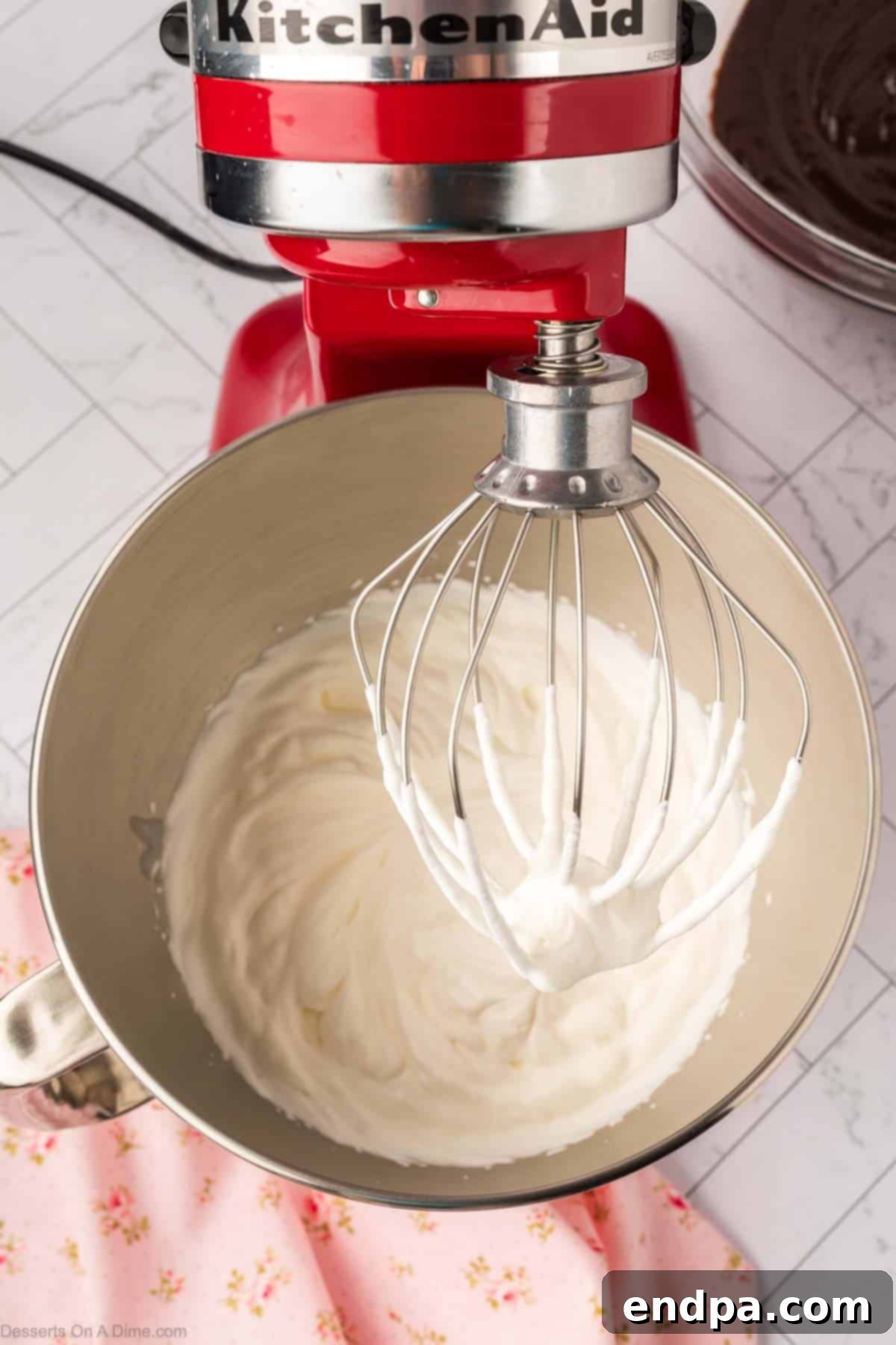 Heavy cream whipped until stiff peaks form.