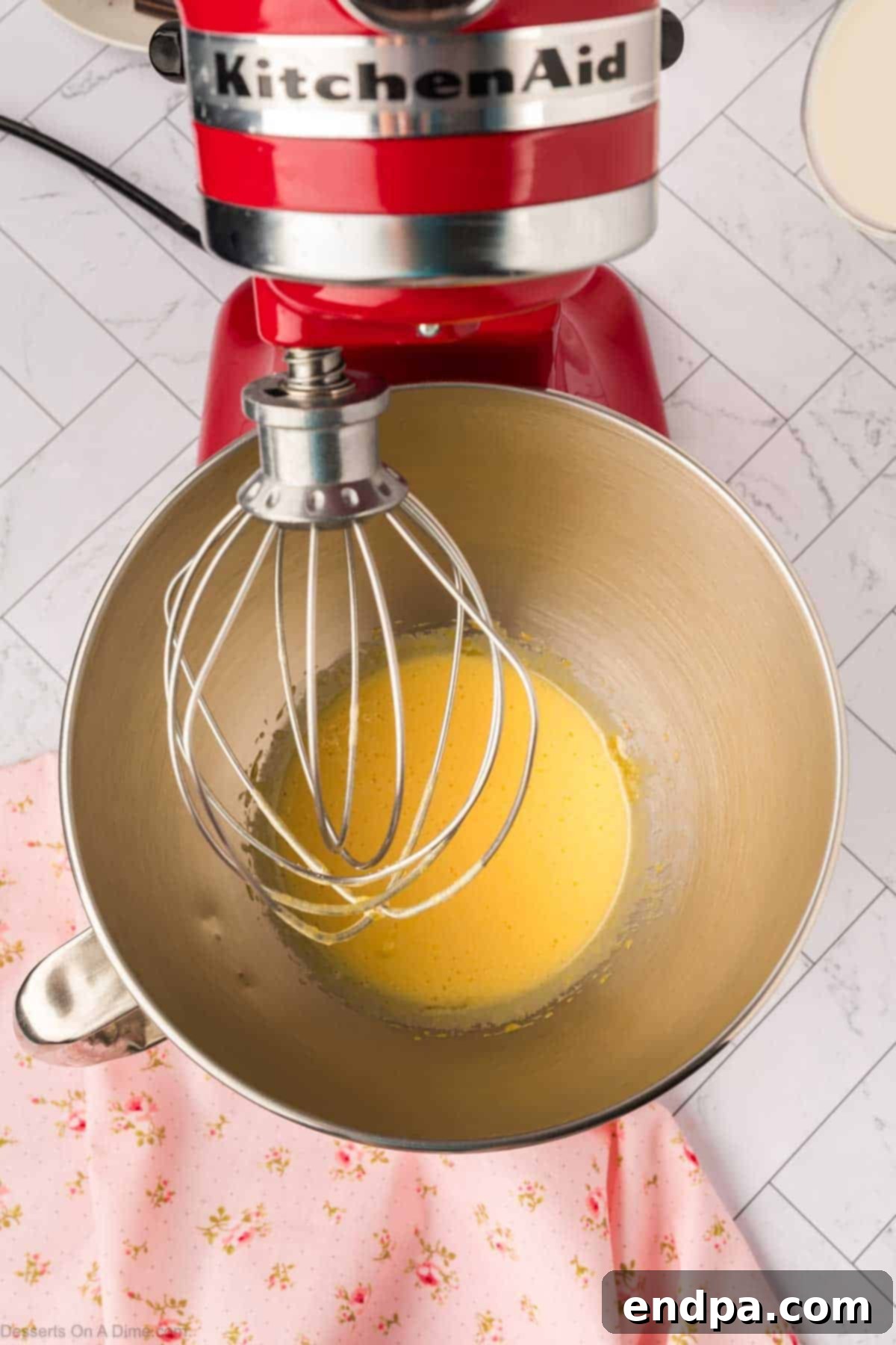 Egg mixture after being beaten until thick and pale.