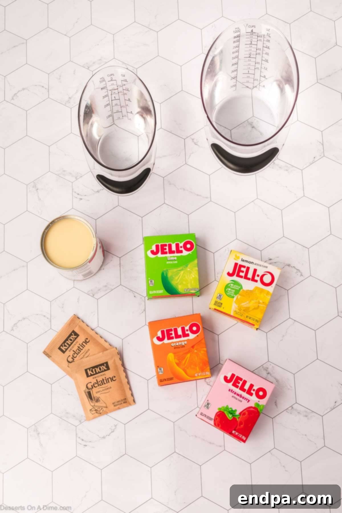 Vibrant Mosaic Gelatin 3 Ingredients for Broken Jello - jello packets, boiling water, unflavored gelatin, hot water and sweetened condensed milk.