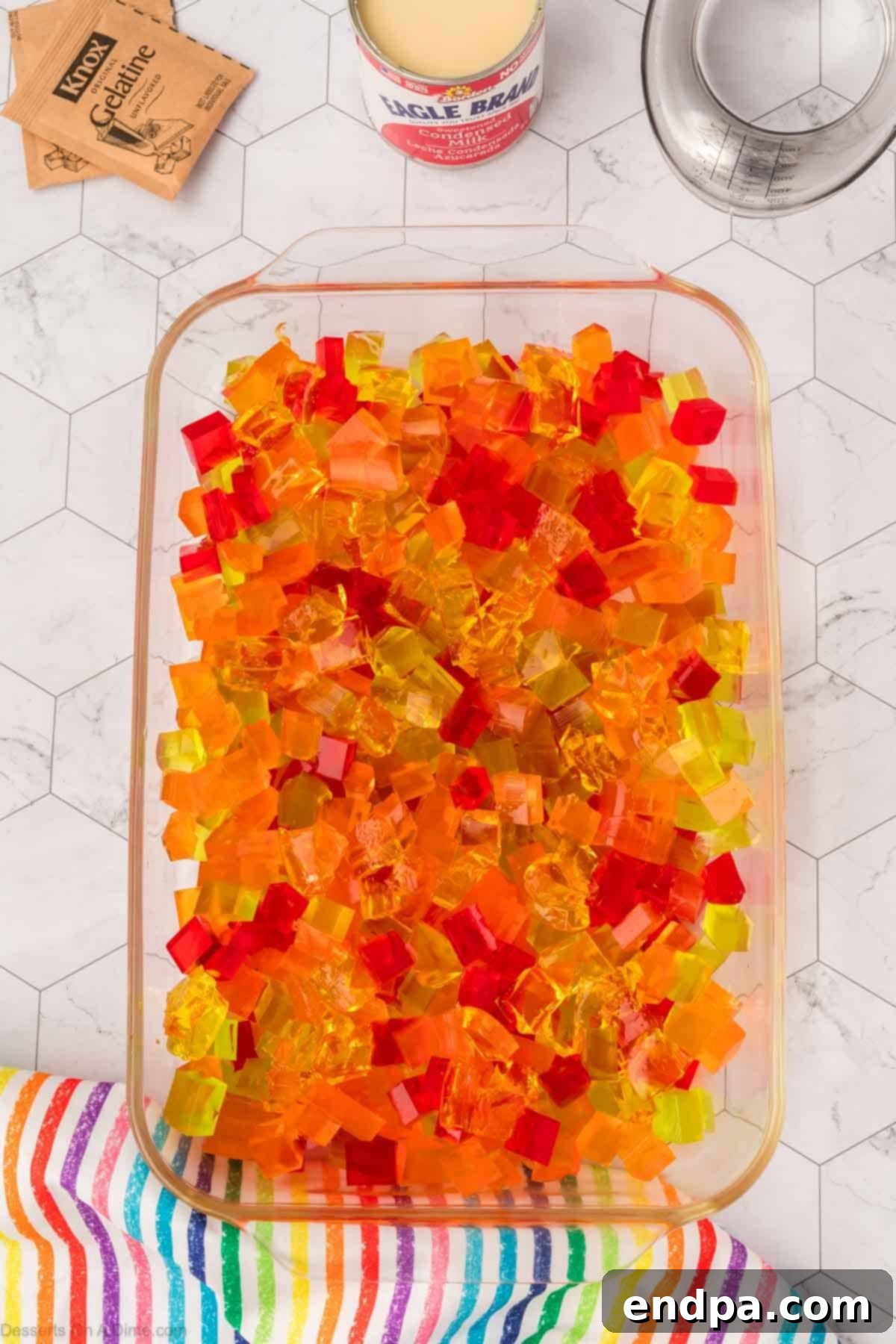 Vibrant Mosaic Gelatin 6 Cubes of jello in pan.