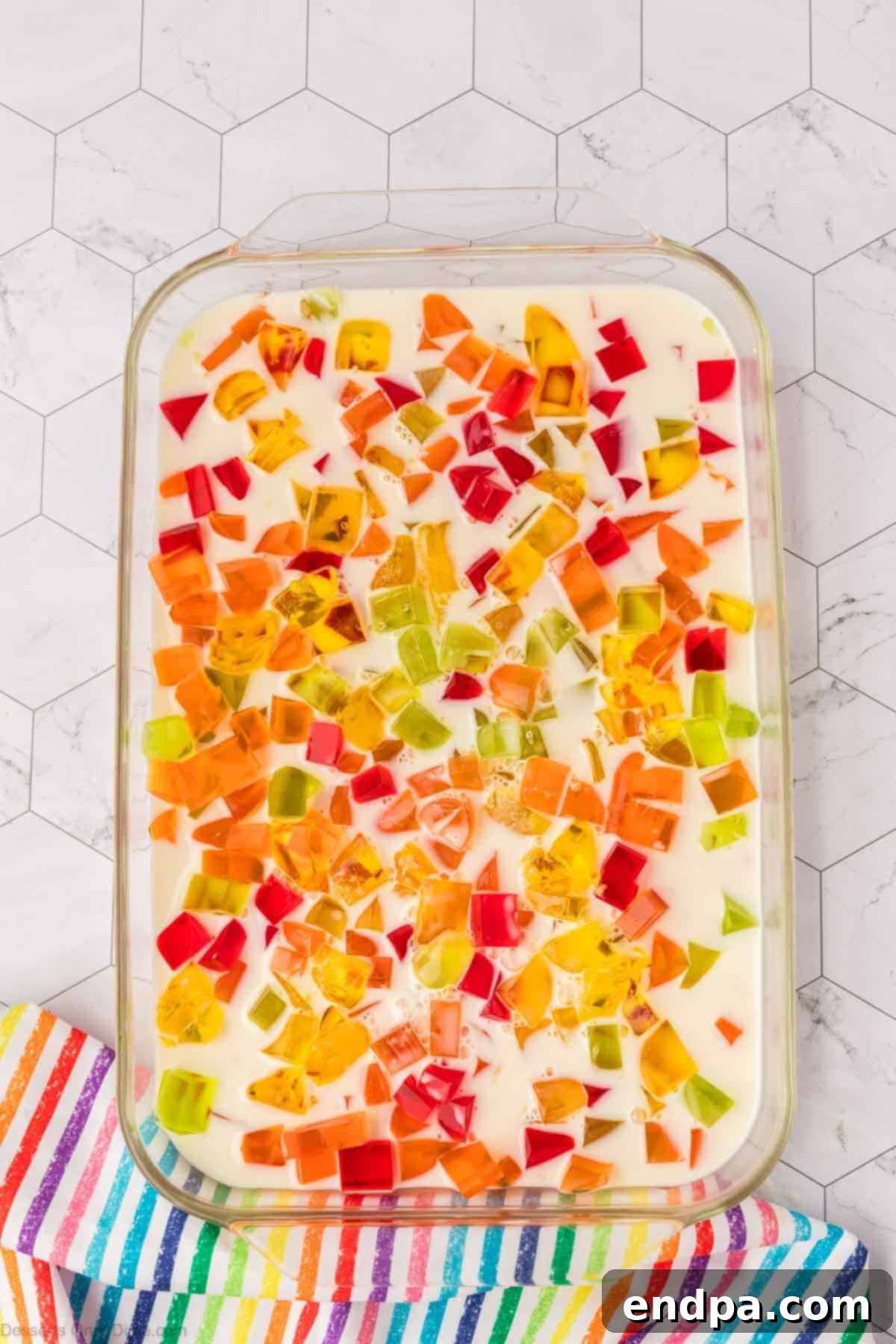 Vibrant Mosaic Gelatin 9 Cubes of jello in baking dish.