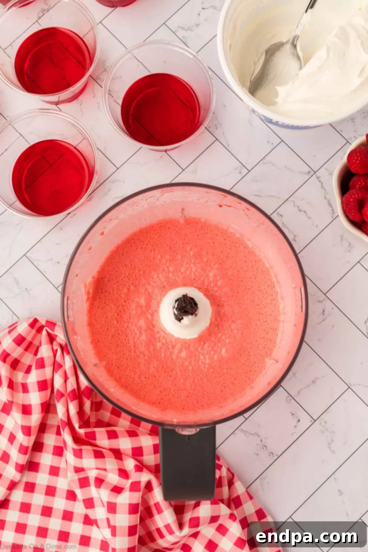 Layered Gelatin Delight 9 The final creamy Jello mixture after all ingredients have been blended together.