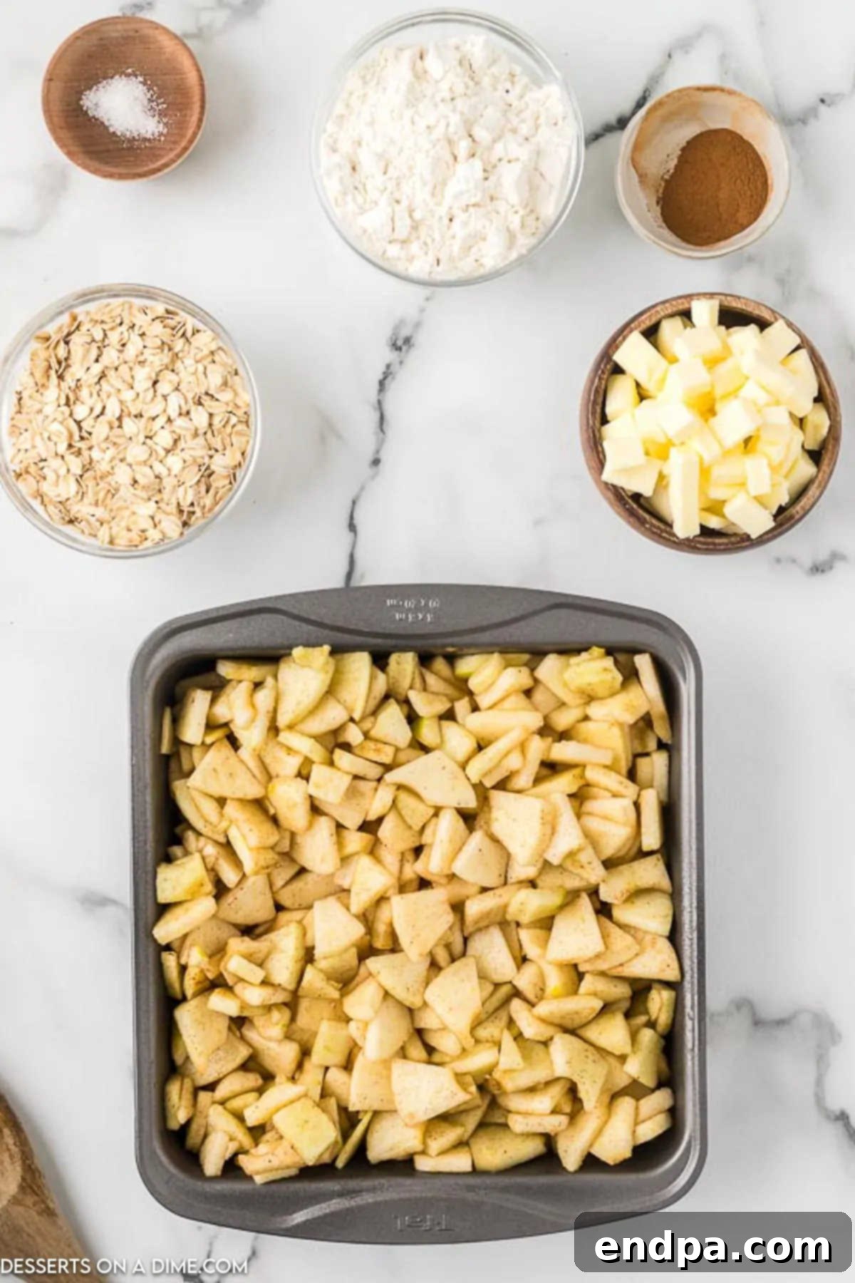 Buttery Oat Apple Crisp 5 Apple mixture spread evenly in a baking dish.