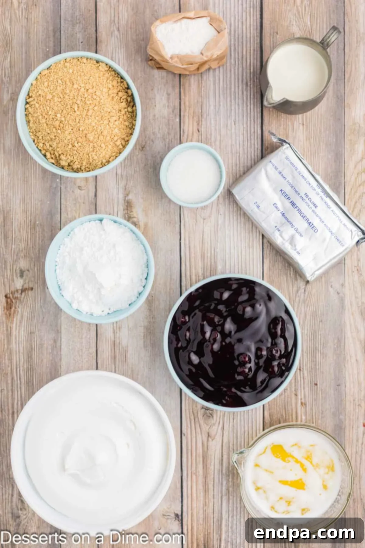 Ingredients for Lemon Blueberry Dessert - graham cracker crumbs, sugar, butter, lemon pudding, half and half, whipped cream, powdered sugar, blueberry pie filling.
