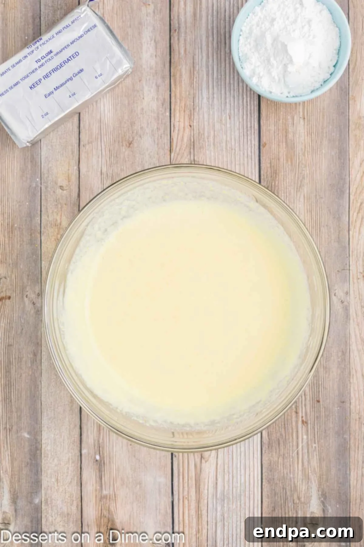 Lemon pudding mixture in a bowl.