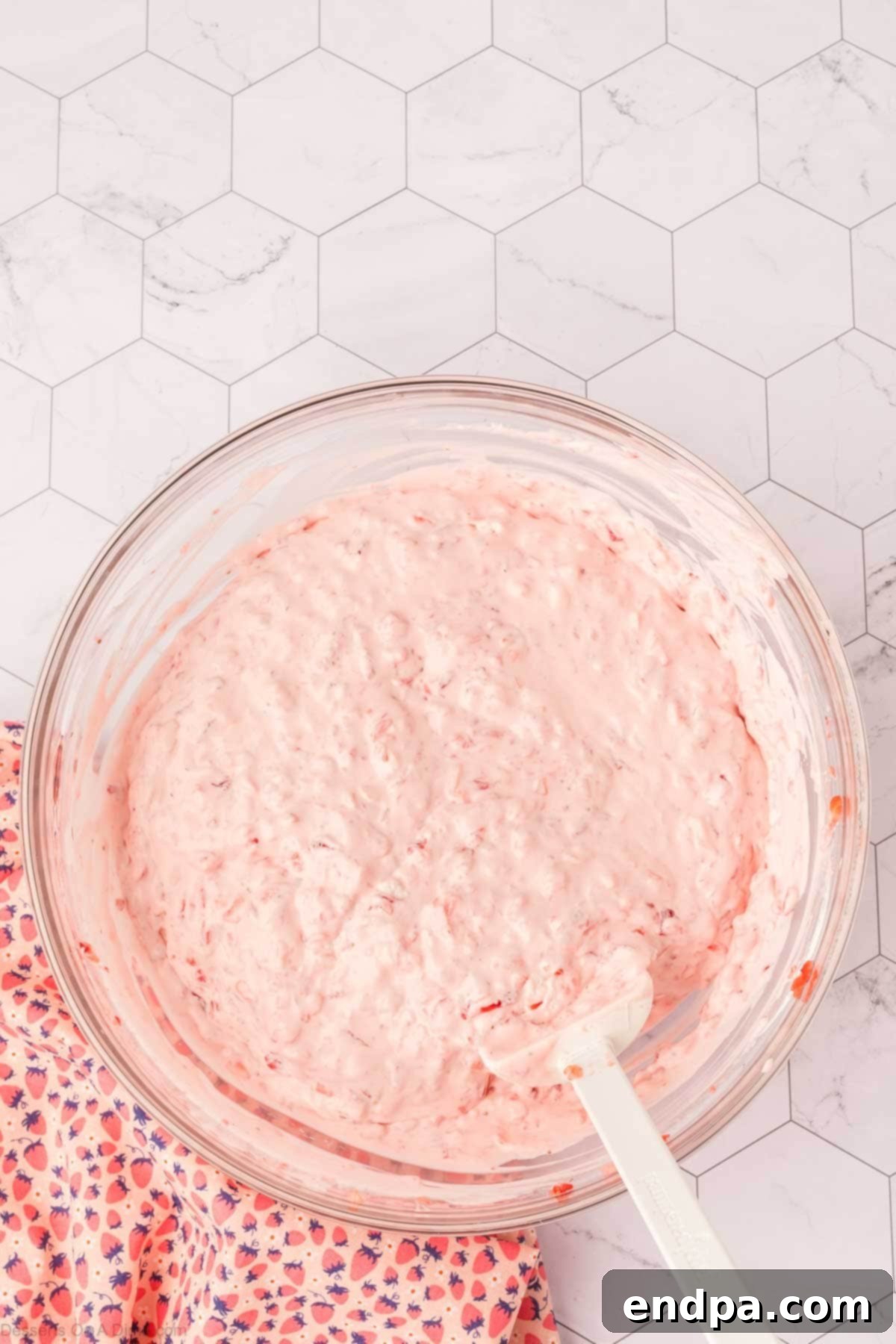 Cheesecake Cloud 7 The combined cheesecake fluff mixture in a bowl, ready to be chilled.