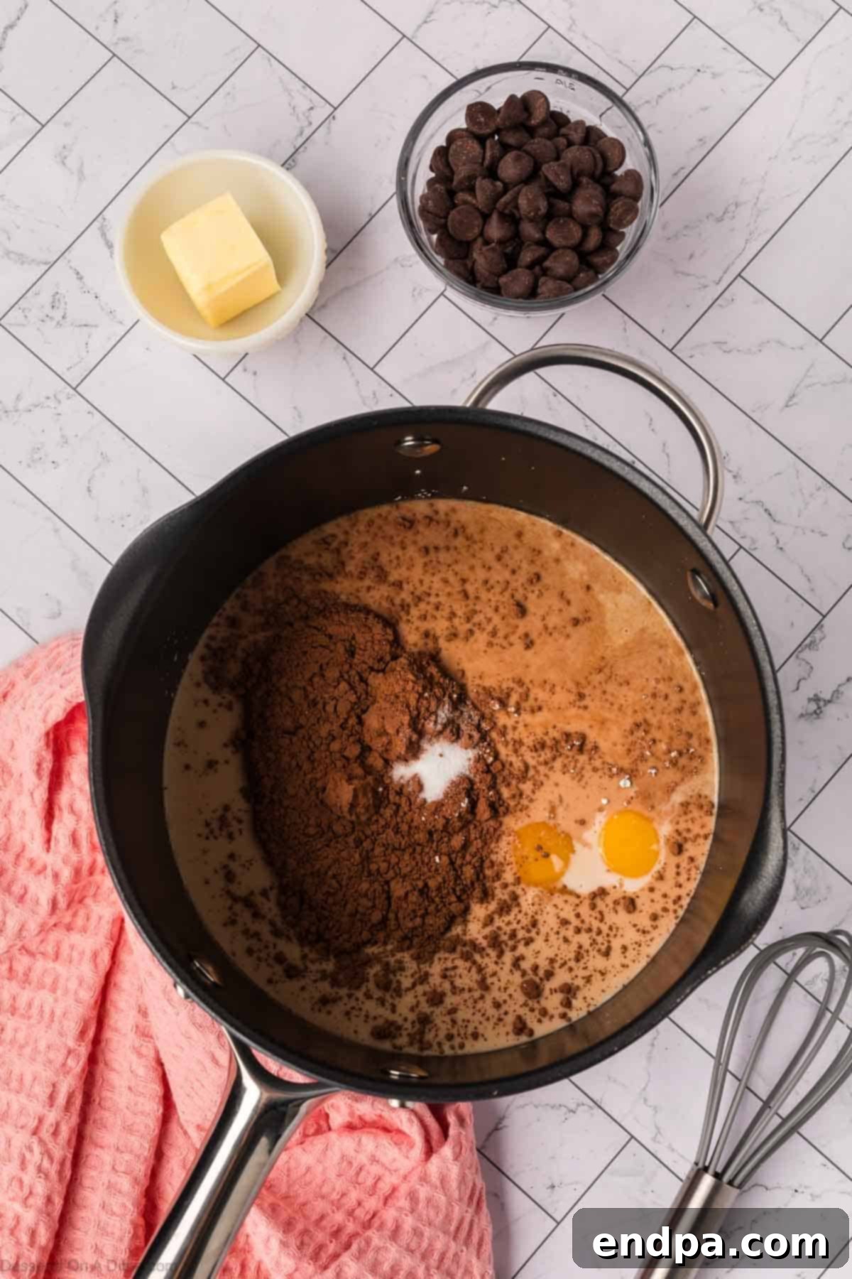 Velvety Dark Chocolate Pudding 4 Egg yolks, milk, sugar, cocoa powder, cornstarch, salt, and vanilla extract are whisked together in a medium saucepan on the stovetop.