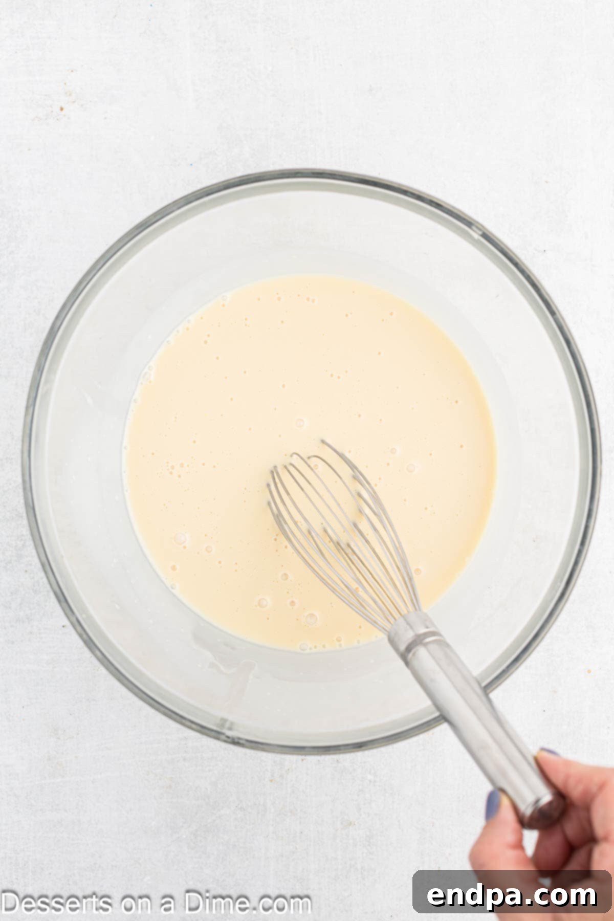 The chilled corn custard mixture in a large bowl.